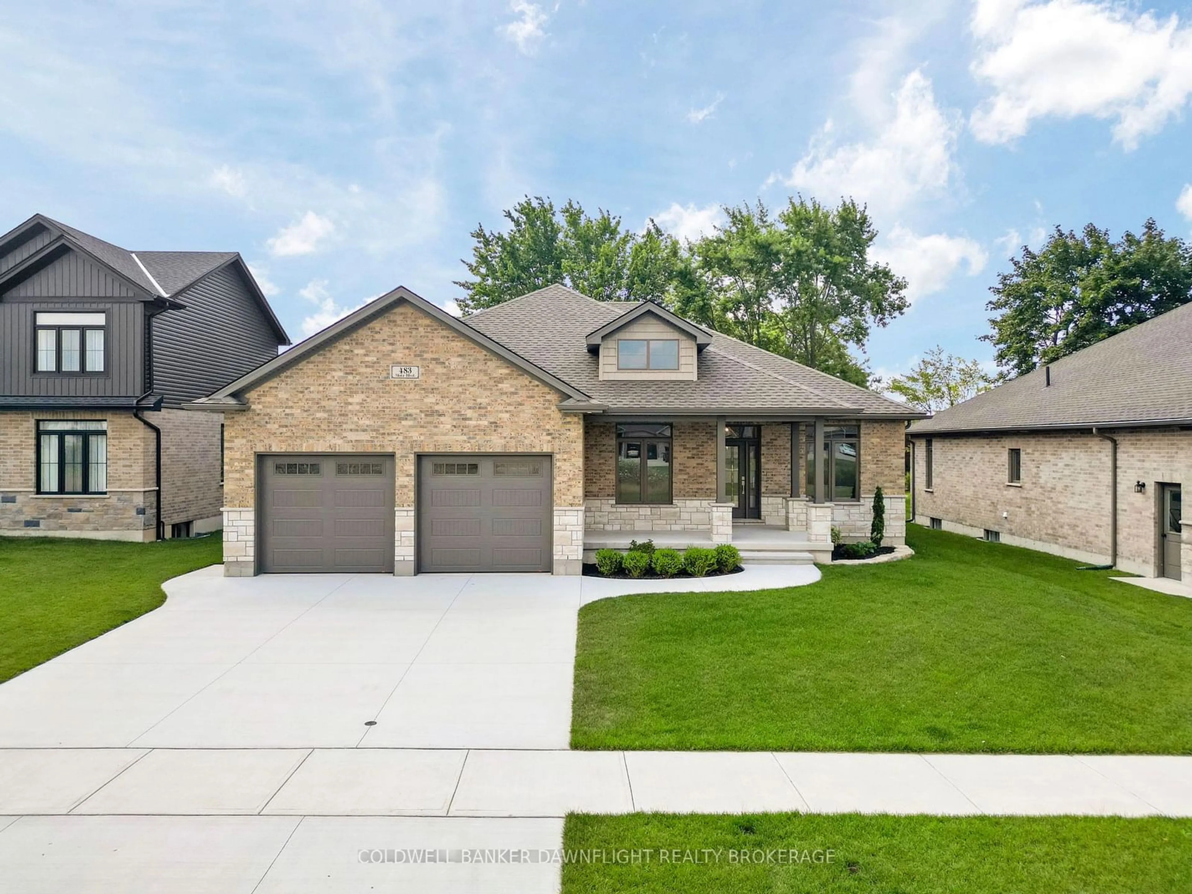 Home with brick exterior material, street for 483 Motz Blvd, South Huron Ontario N0M 1S1