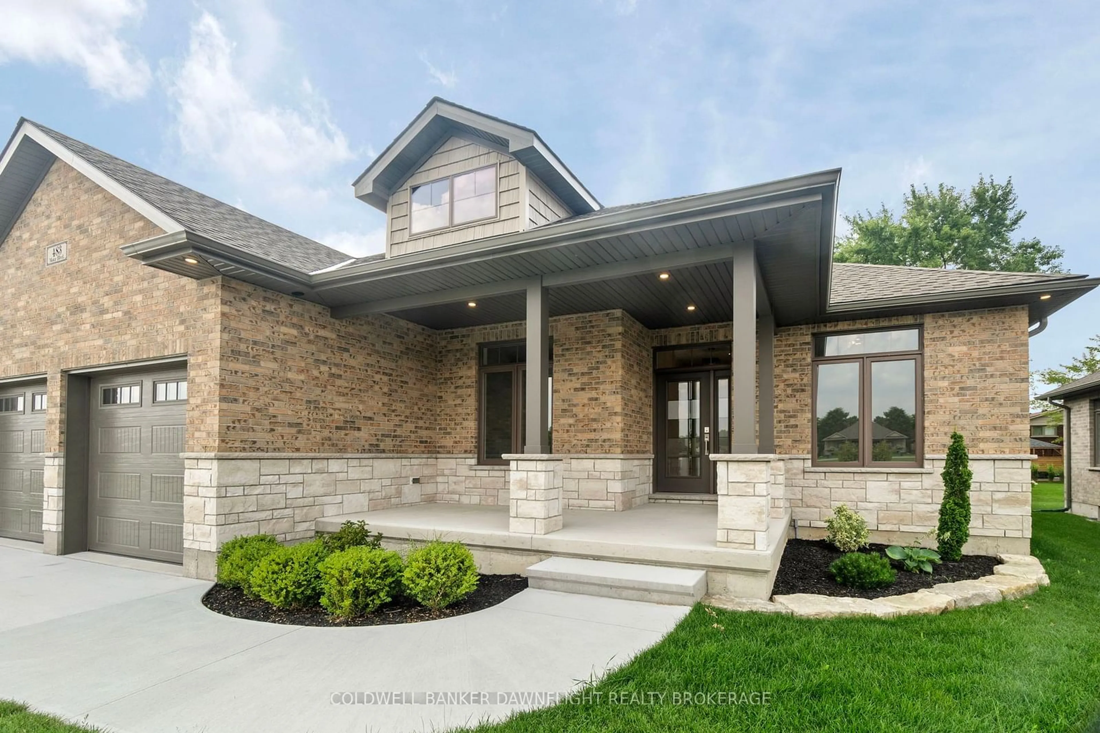 Home with brick exterior material, street for 483 Motz Blvd, South Huron Ontario N0M 1S1
