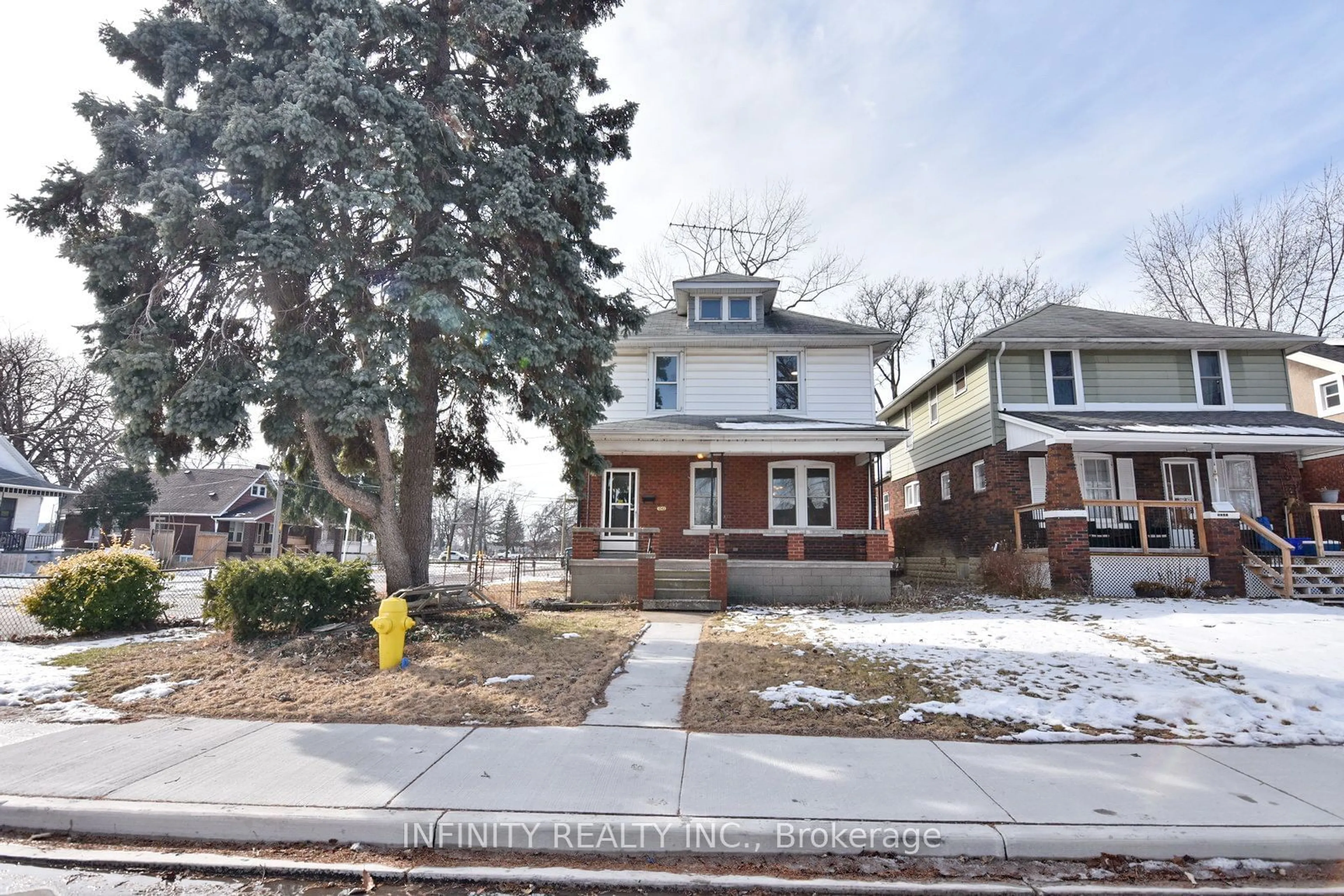 Home with brick exterior material, street for 1243 Lillian Ave, Windsor Ontario N8X 4A2