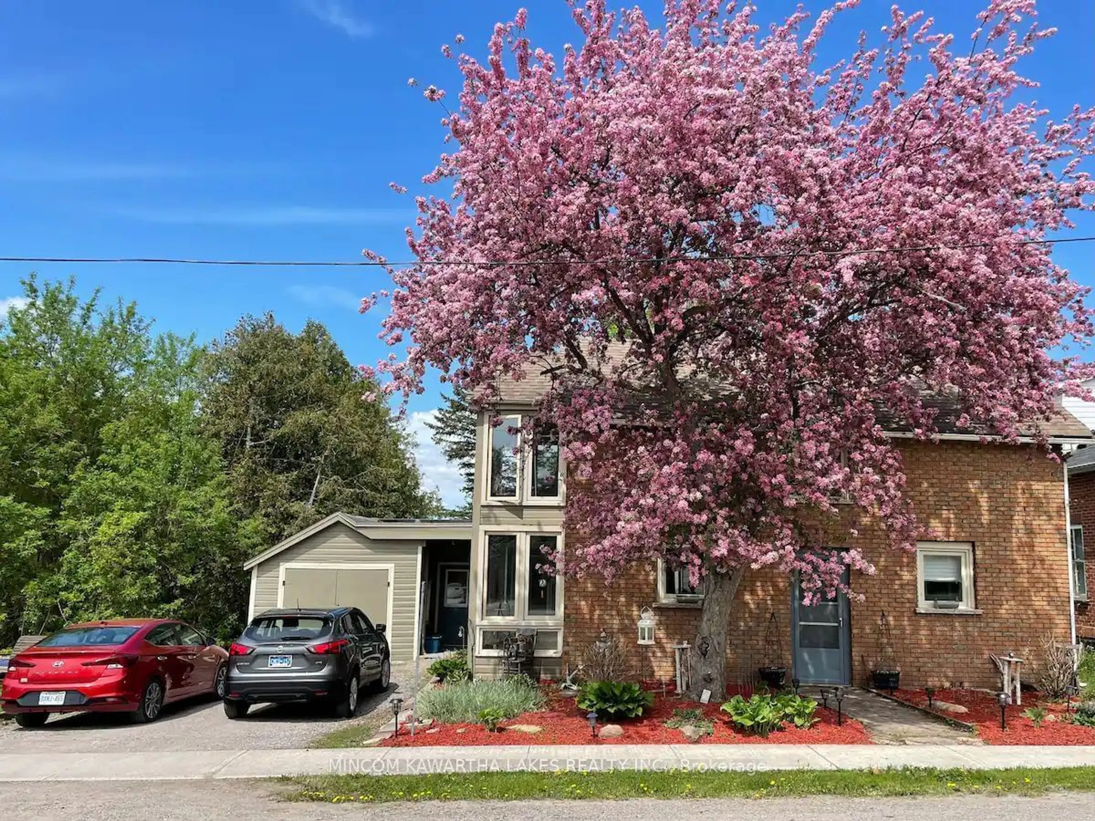 Home with brick exterior material, street for 800 Hunter St, Smith-Ennismore-Lakefield Ontario K0L 1H0