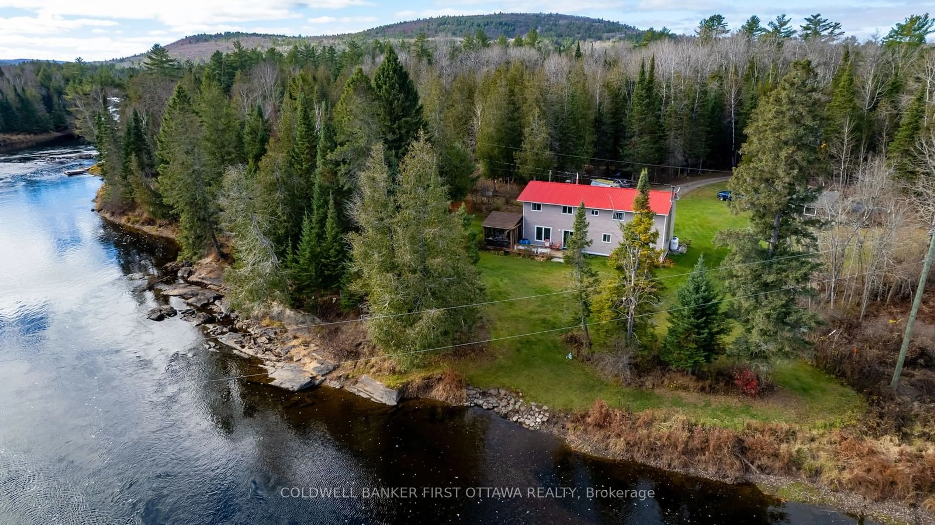 A pic from outside/outdoor area/front of a property/back of a property/a pic from drone, water/lake/river/ocean view for 27 Harrison Tr, Greater Madawaska Ontario K0J 2R0