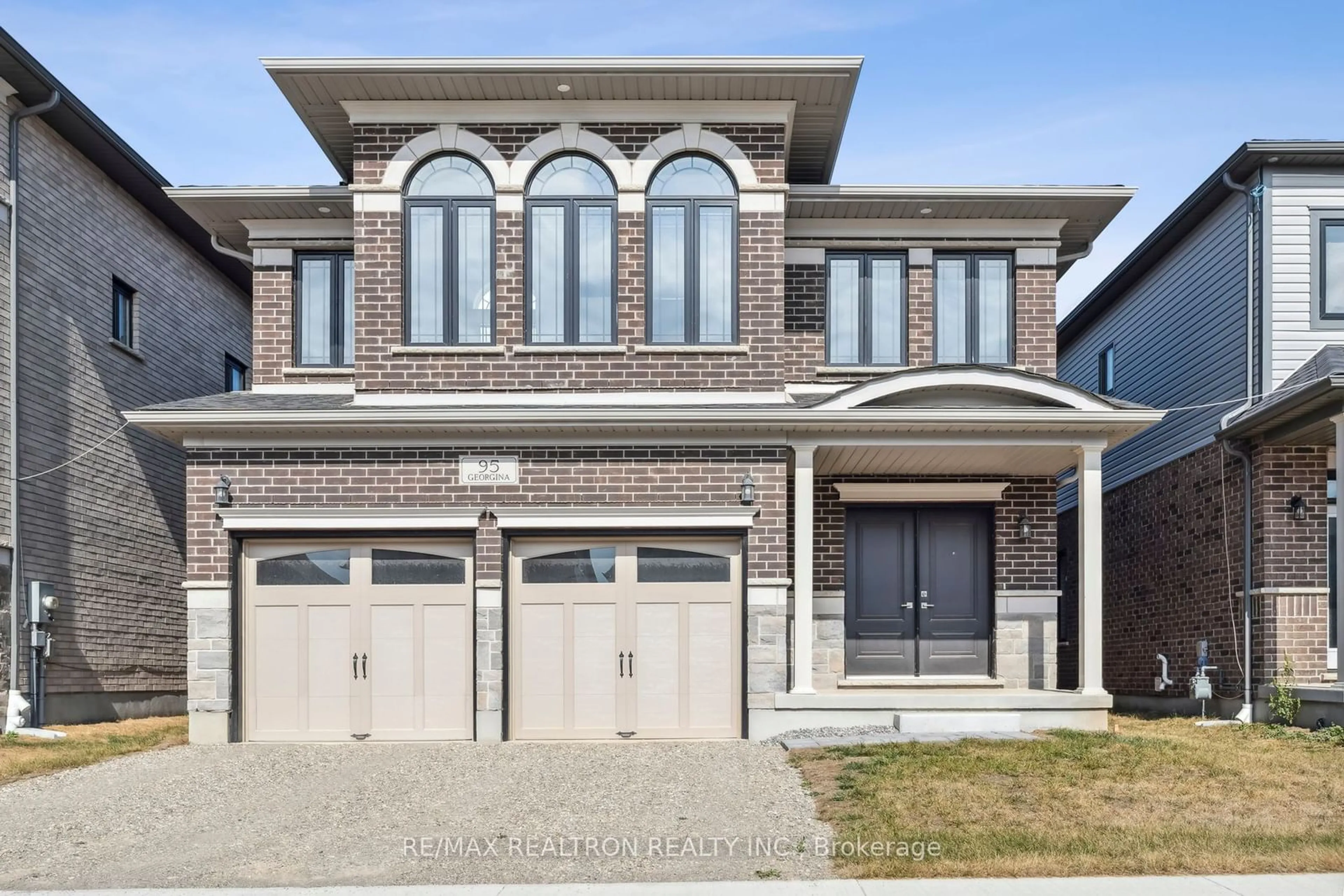 Home with brick exterior material, street for 95 Georgina St, Kitchener Ontario N2R 0S6