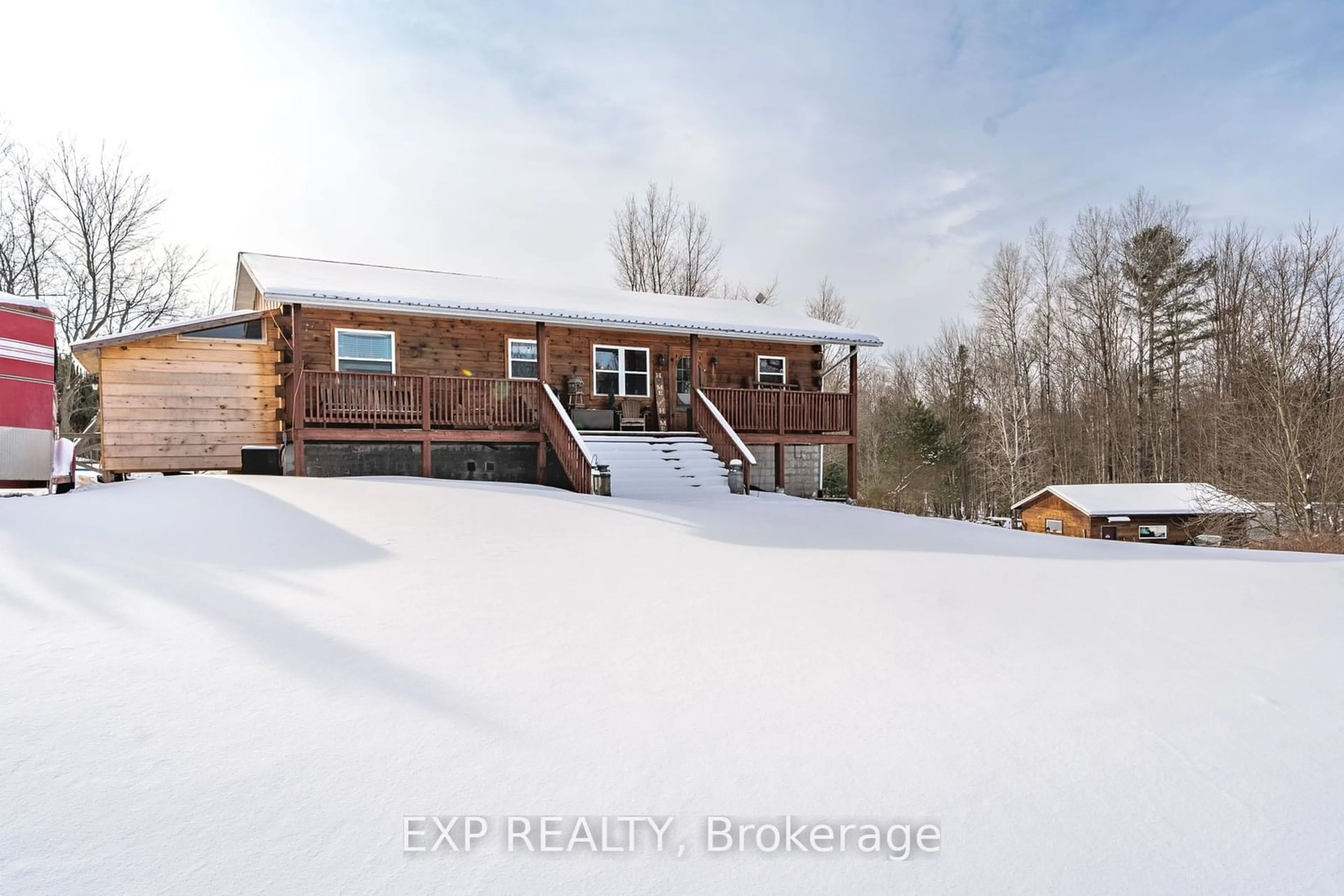 A pic from outside/outdoor area/front of a property/back of a property/a pic from drone, building for 1469 Queensborough Rd, Madoc Ontario K0K 2K0