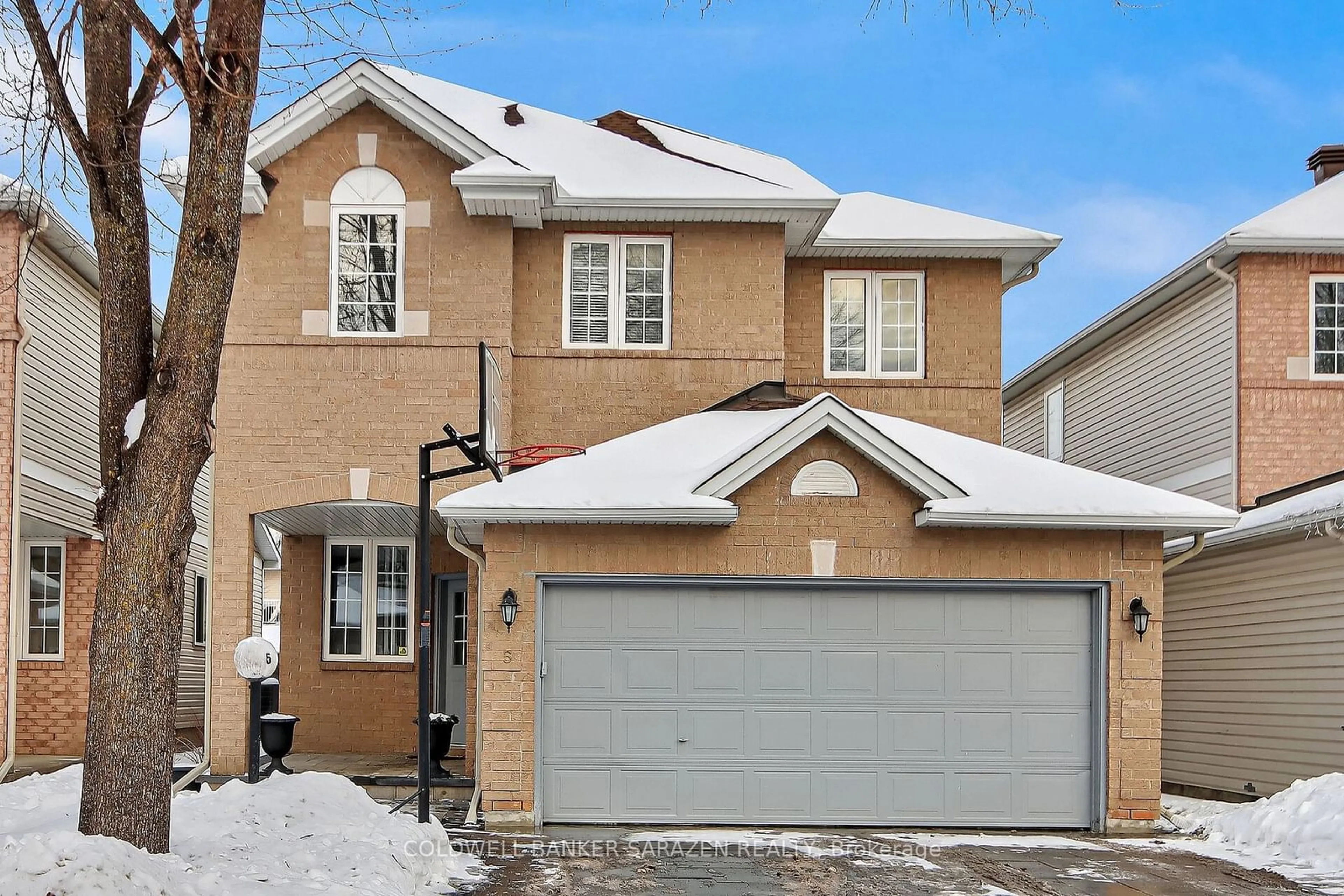 Home with brick exterior material, street for 5 WHITECHAPEL Cres, Barrhaven Ontario K2J 5A1