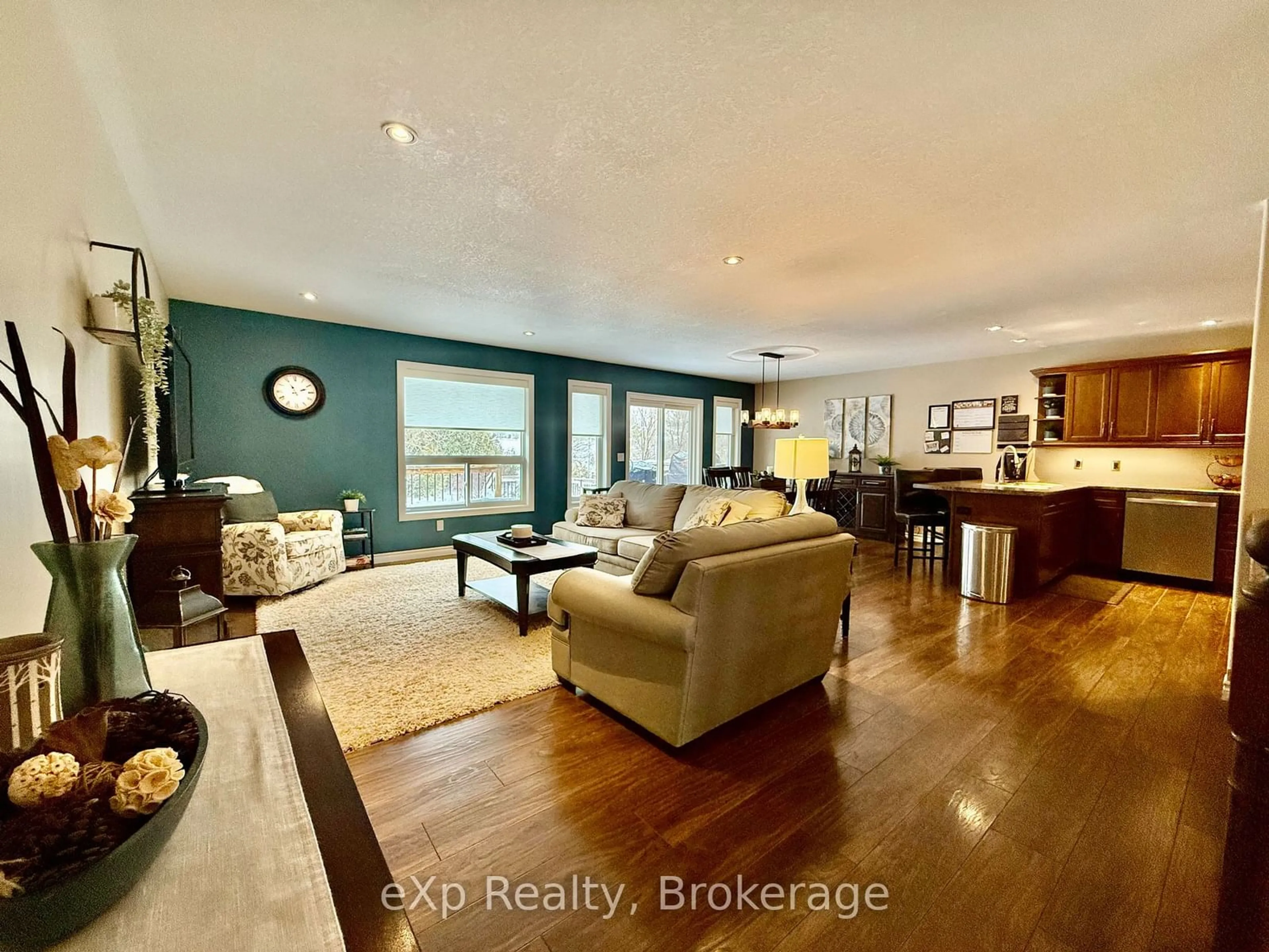 Living room with furniture, wood/laminate floor for 780 17th St, Hanover Ontario N4N 3X4