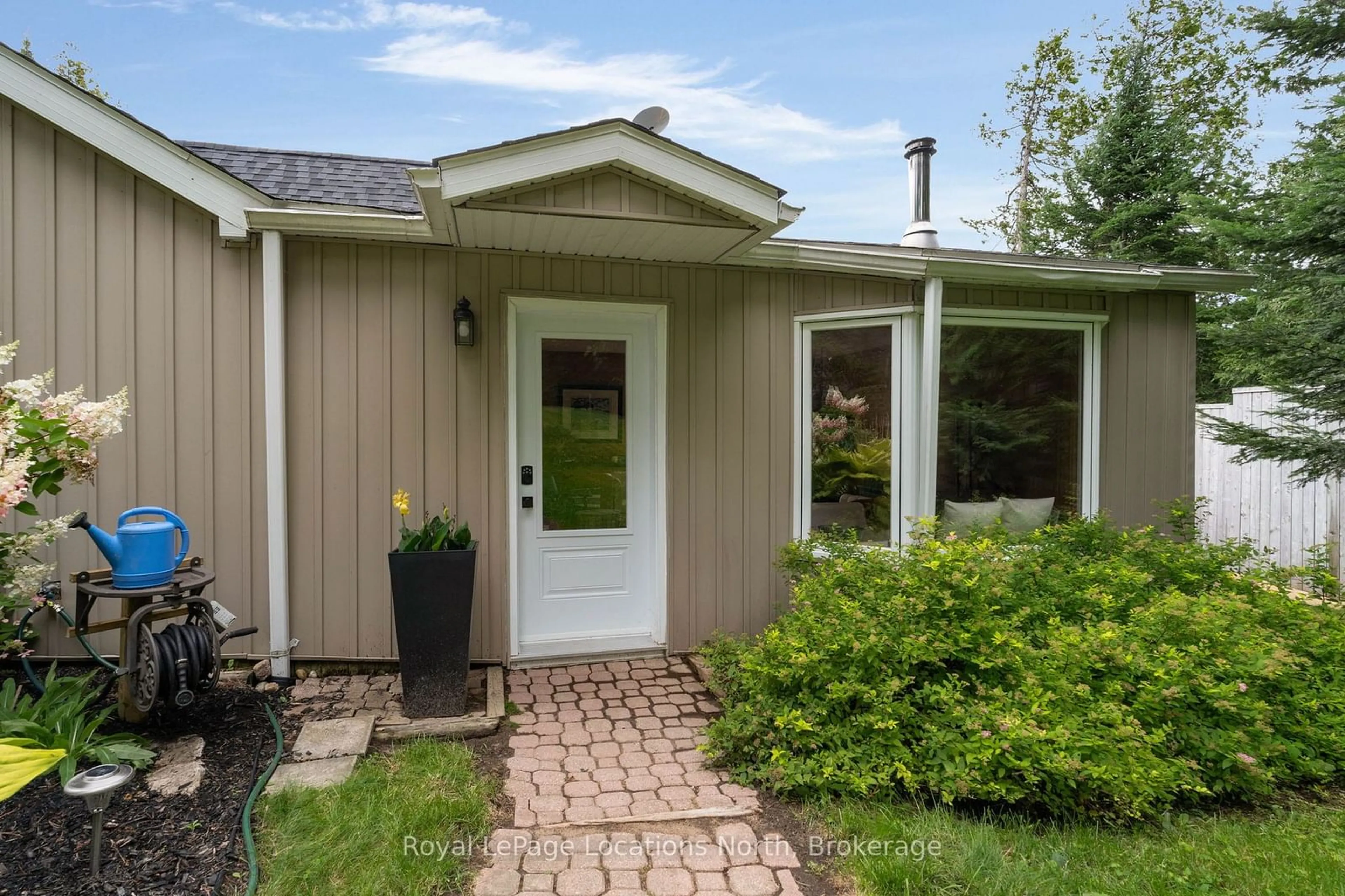 Home with vinyl exterior material, street for 1433 South Horn Lk Rd, Ryerson Ontario P0A 1C0