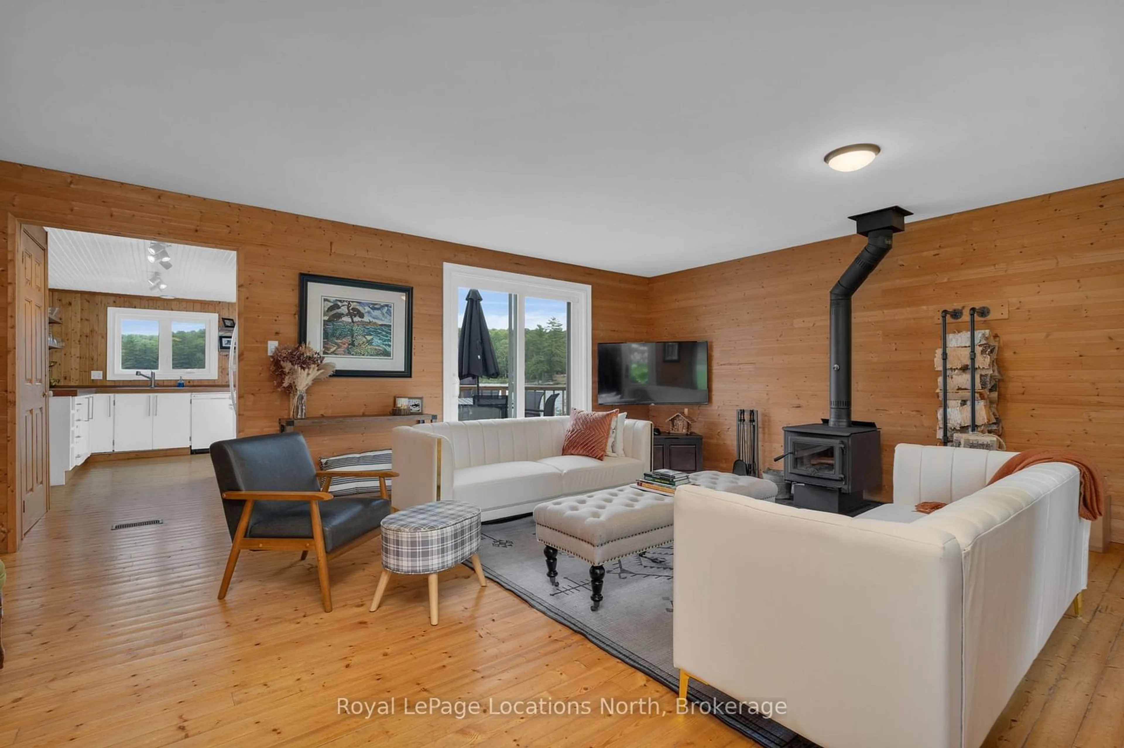 Living room with furniture, wood/laminate floor for 1433 South Horn Lk Rd, Ryerson Ontario P0A 1C0