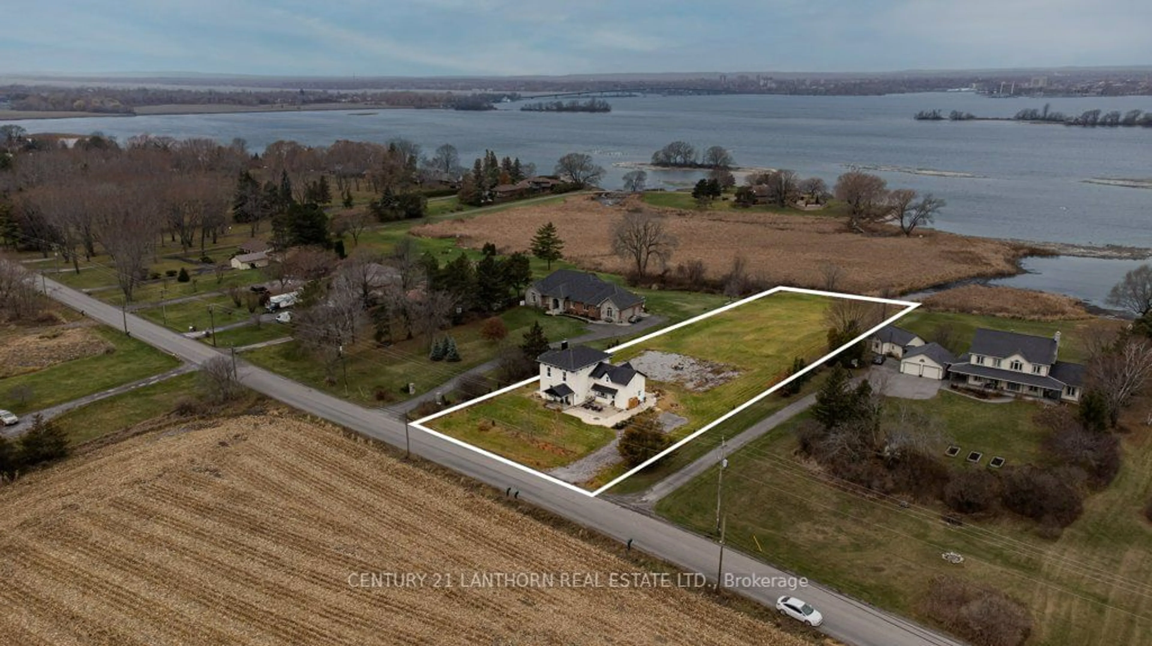 A pic from outside/outdoor area/front of a property/back of a property/a pic from drone, water/lake/river/ocean view for 395 Massassauga Rd, Prince Edward County Ontario K8N 4Z7