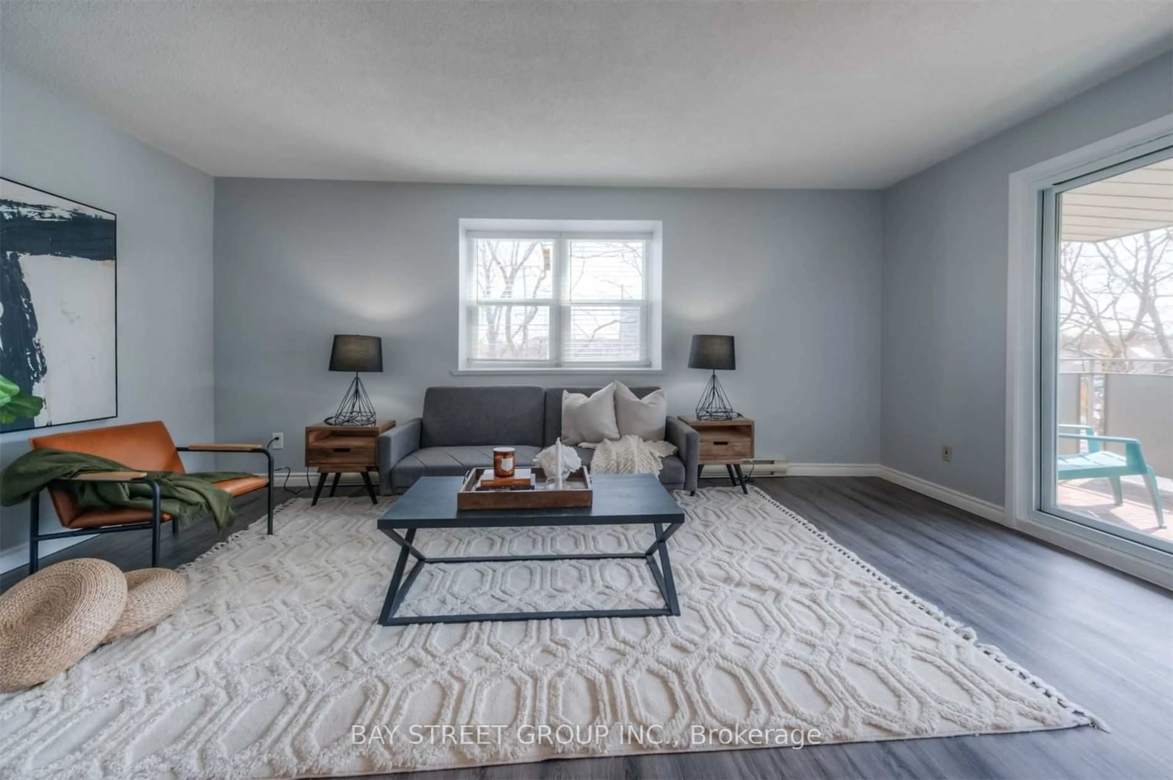 Living room with furniture, carpet floor for 83 Westmount Rd #2, Waterloo Ontario N2L 5G5