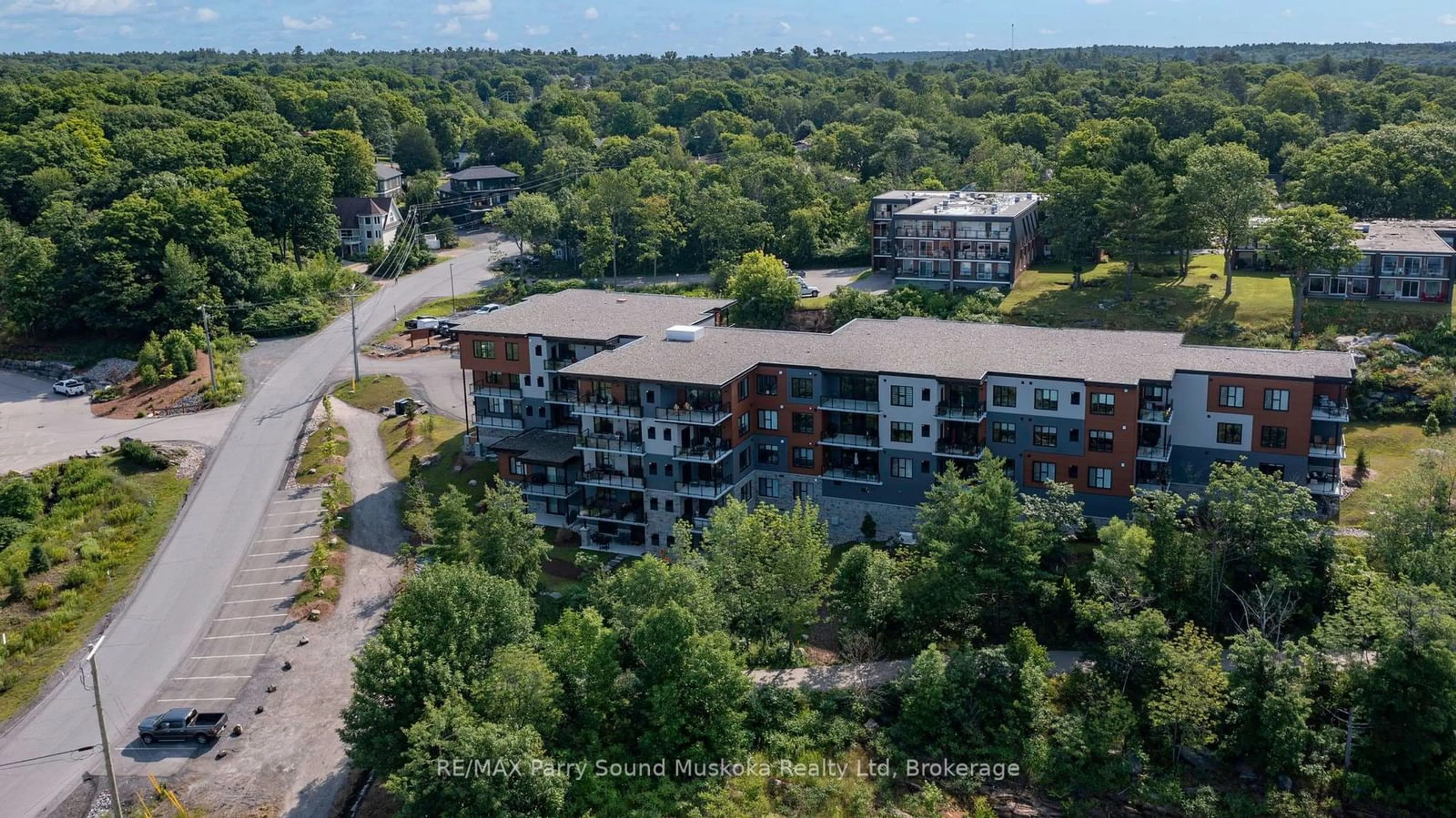 A pic from outside/outdoor area/front of a property/back of a property/a pic from drone, unknown for 20 SALT DOCK Rd #305, Parry Sound Ontario P2A 0E7