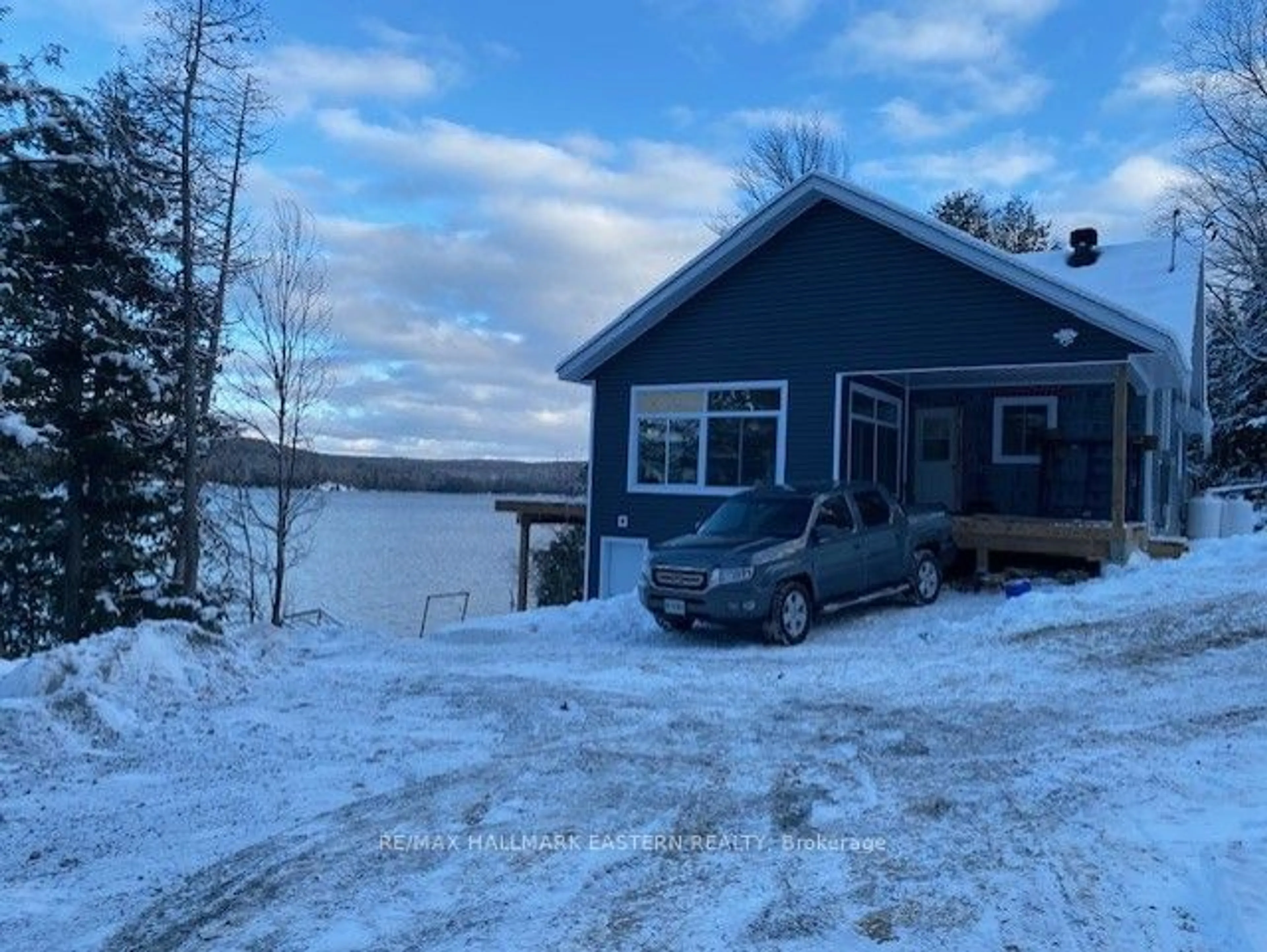 A pic from outside/outdoor area/front of a property/back of a property/a pic from drone, water/lake/river/ocean view for 1744 PAPINEAU LAKE Rd, Hastings Highlands Ontario K0L 2S0