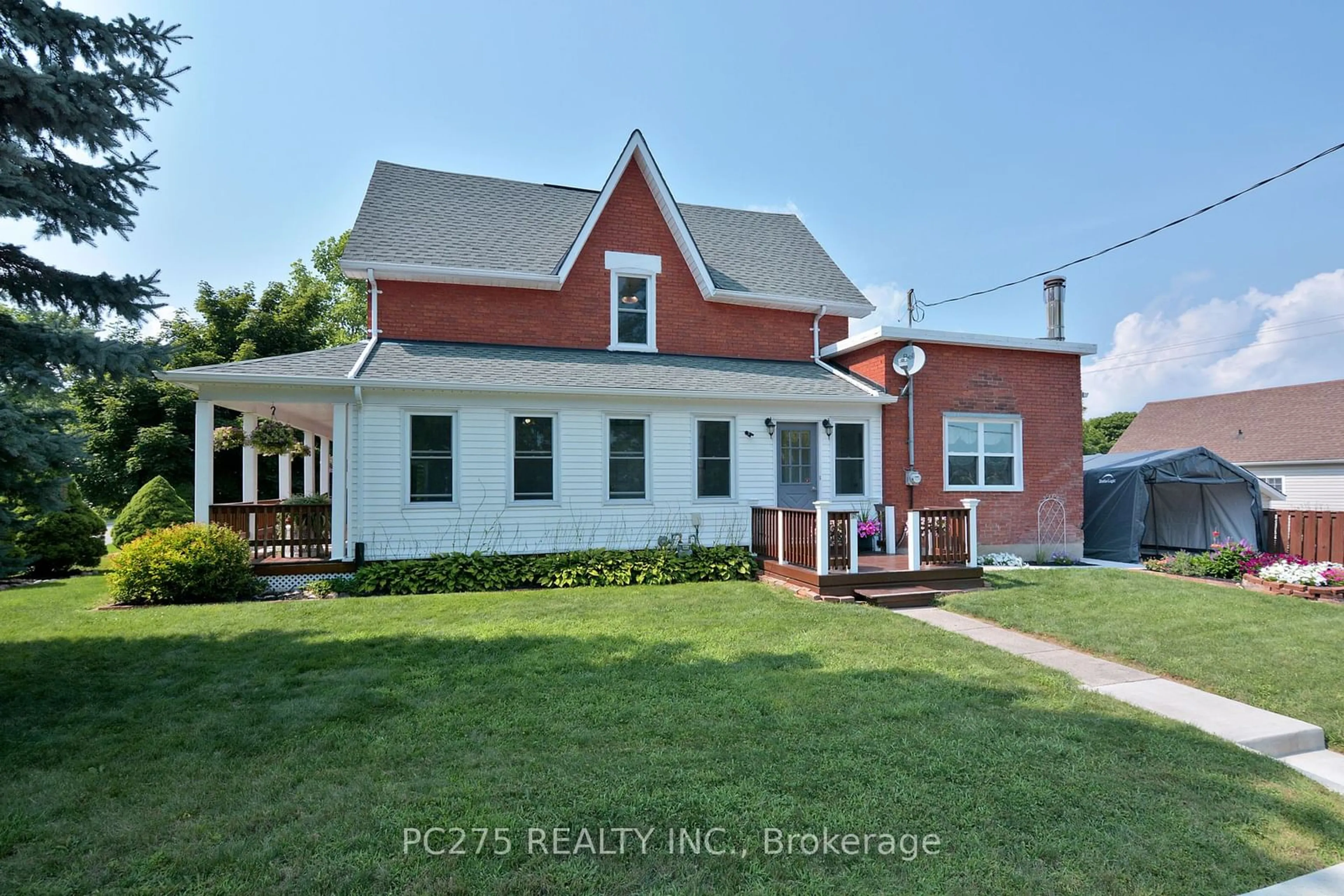 A pic from outside/outdoor area/front of a property/back of a property/a pic from drone, street for 121 Currie Rd, Dutton/Dunwich Ontario N0L 1J0