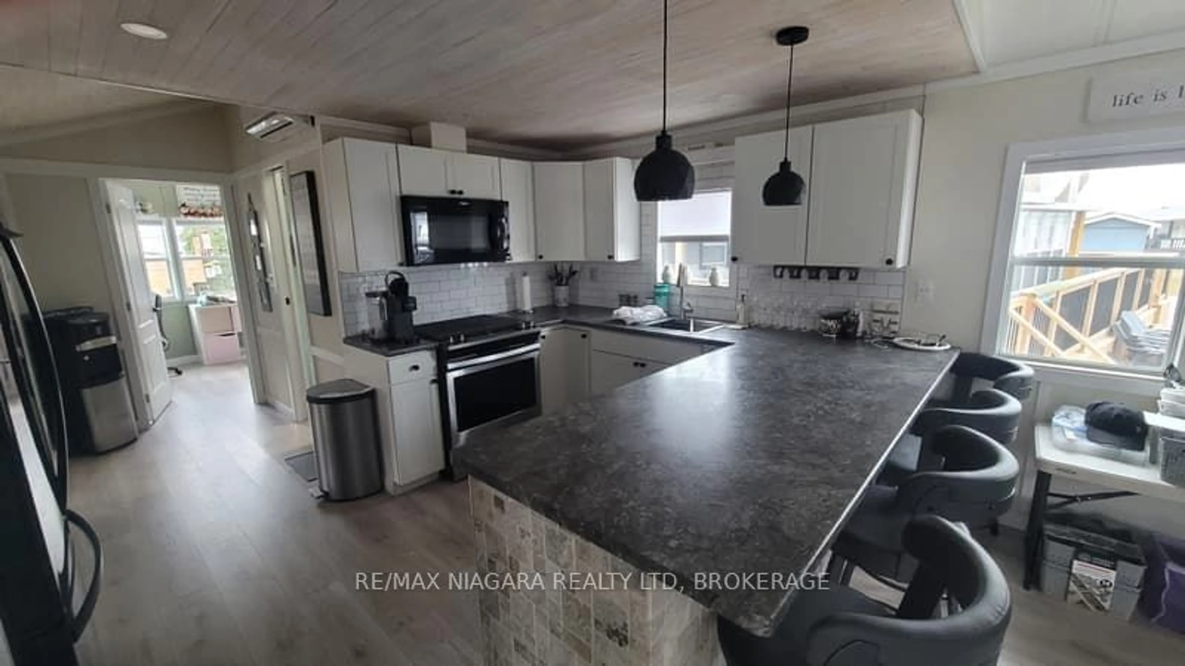 Open concept kitchen, ceramic/tile floor for 490 Empire Rd #EBW13, Port Colborne Ontario L0S 1R0