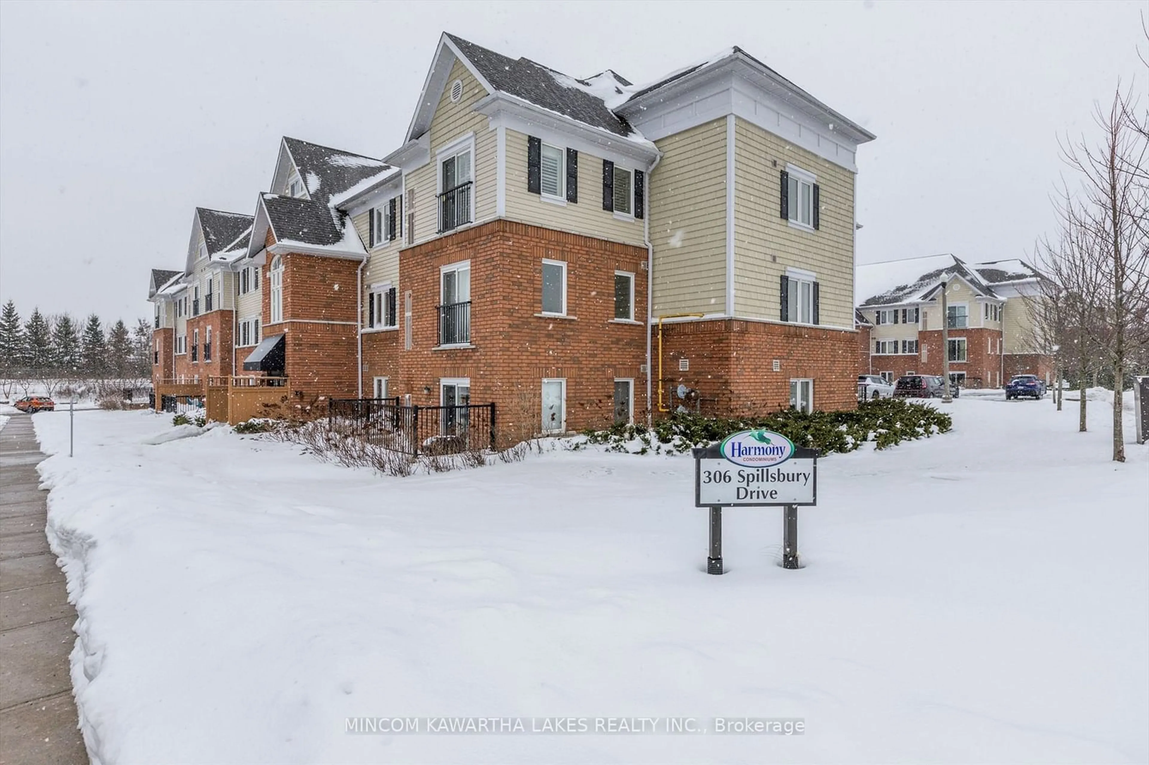 A pic from outside/outdoor area/front of a property/back of a property/a pic from drone, mountain view for 306 Spillsbury Dr #102, Peterborough Ontario K9K 0B5