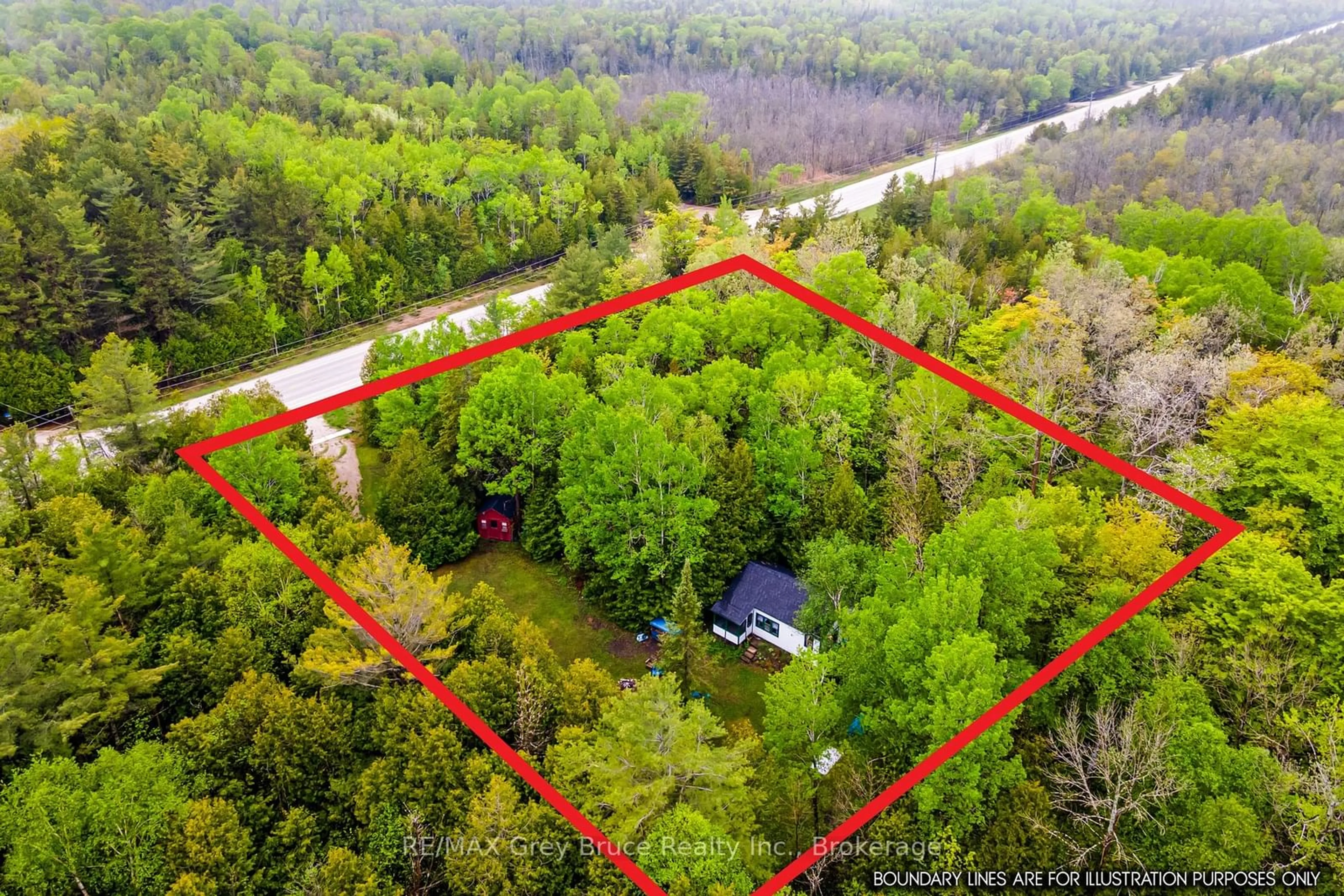 A pic from outside/outdoor area/front of a property/back of a property/a pic from drone, forest/trees view for 6726 Highway 6, Northern Bruce Peninsula Ontario N0H 2R0