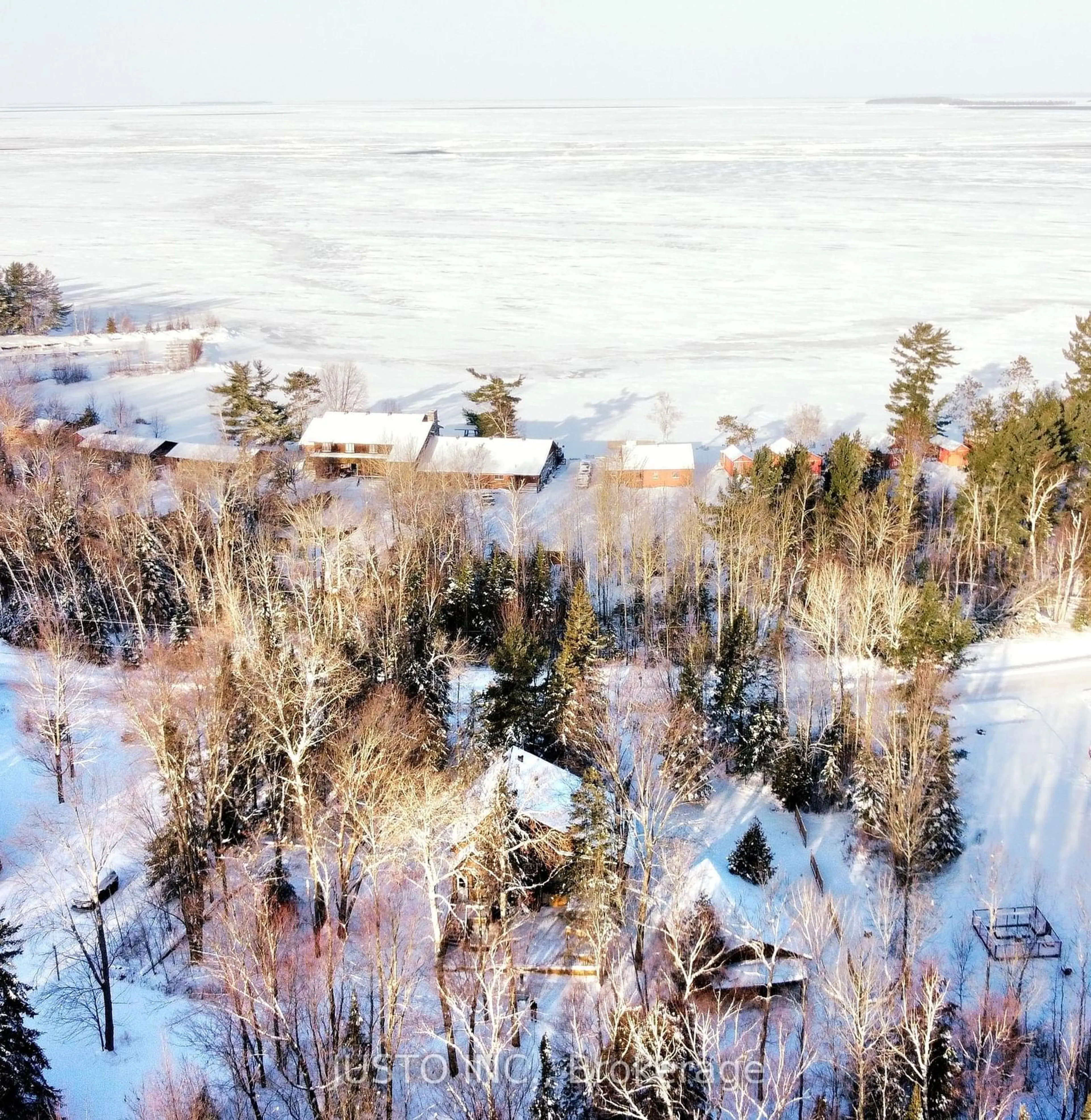 A pic from outside/outdoor area/front of a property/back of a property/a pic from drone, water/lake/river/ocean view for 525 Waltonian Dr, Callander Ontario P0H 1H0