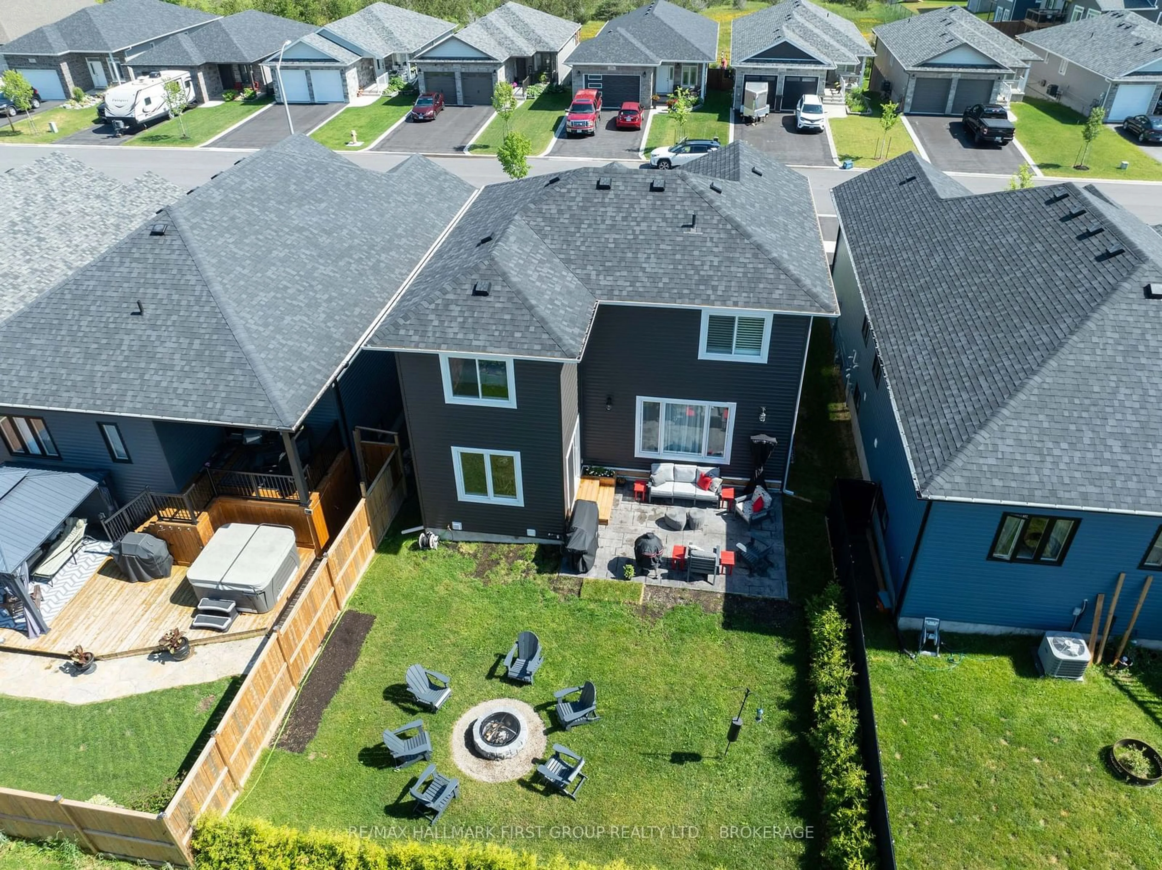 A pic from outside/outdoor area/front of a property/back of a property/a pic from drone, street for 135 Brennan Cres, Loyalist Ontario K0H 2H0