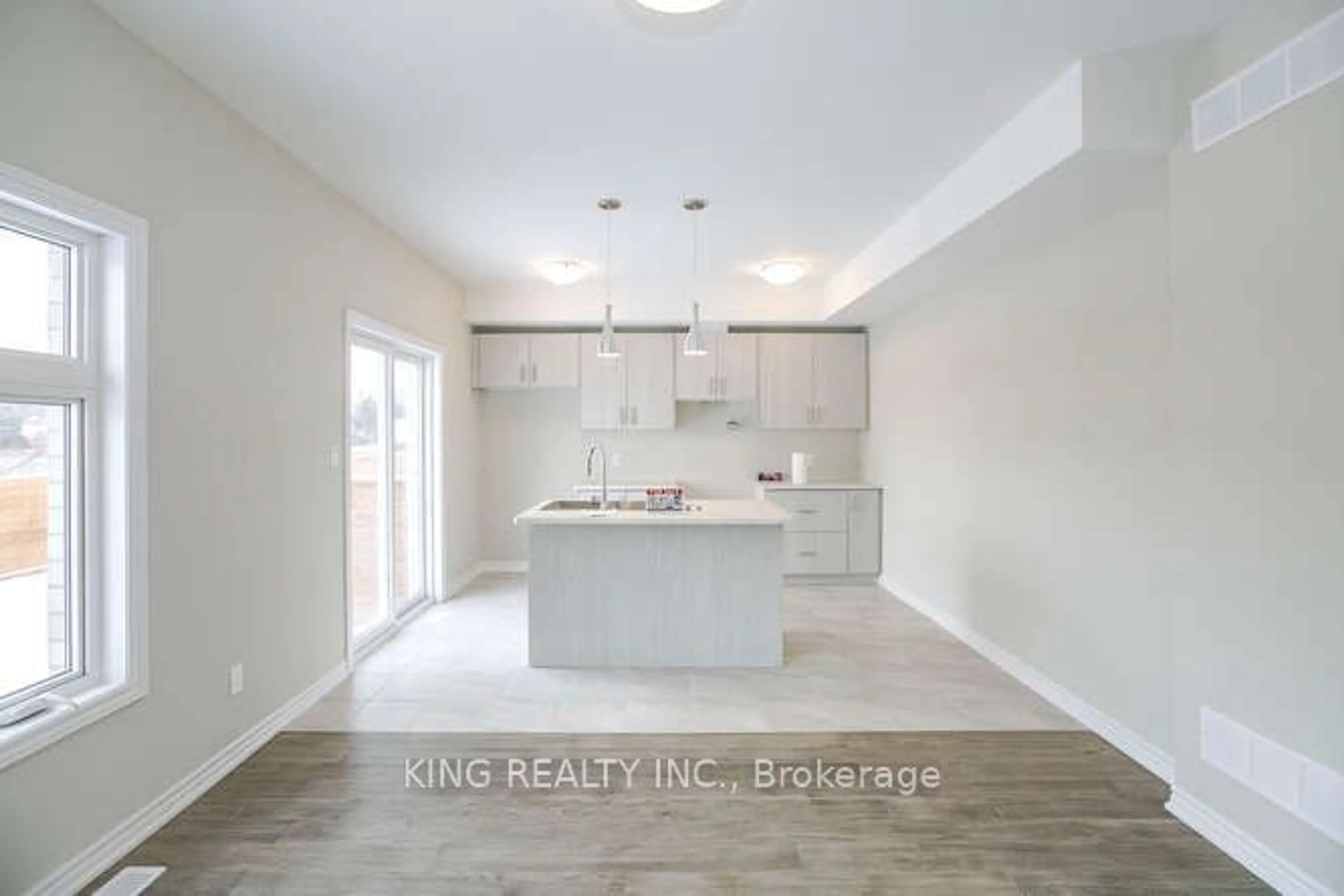 Open concept kitchen, ceramic/tile floor for 5678 Dorchester Rd #7, Niagara Falls Ontario L2G 5S3