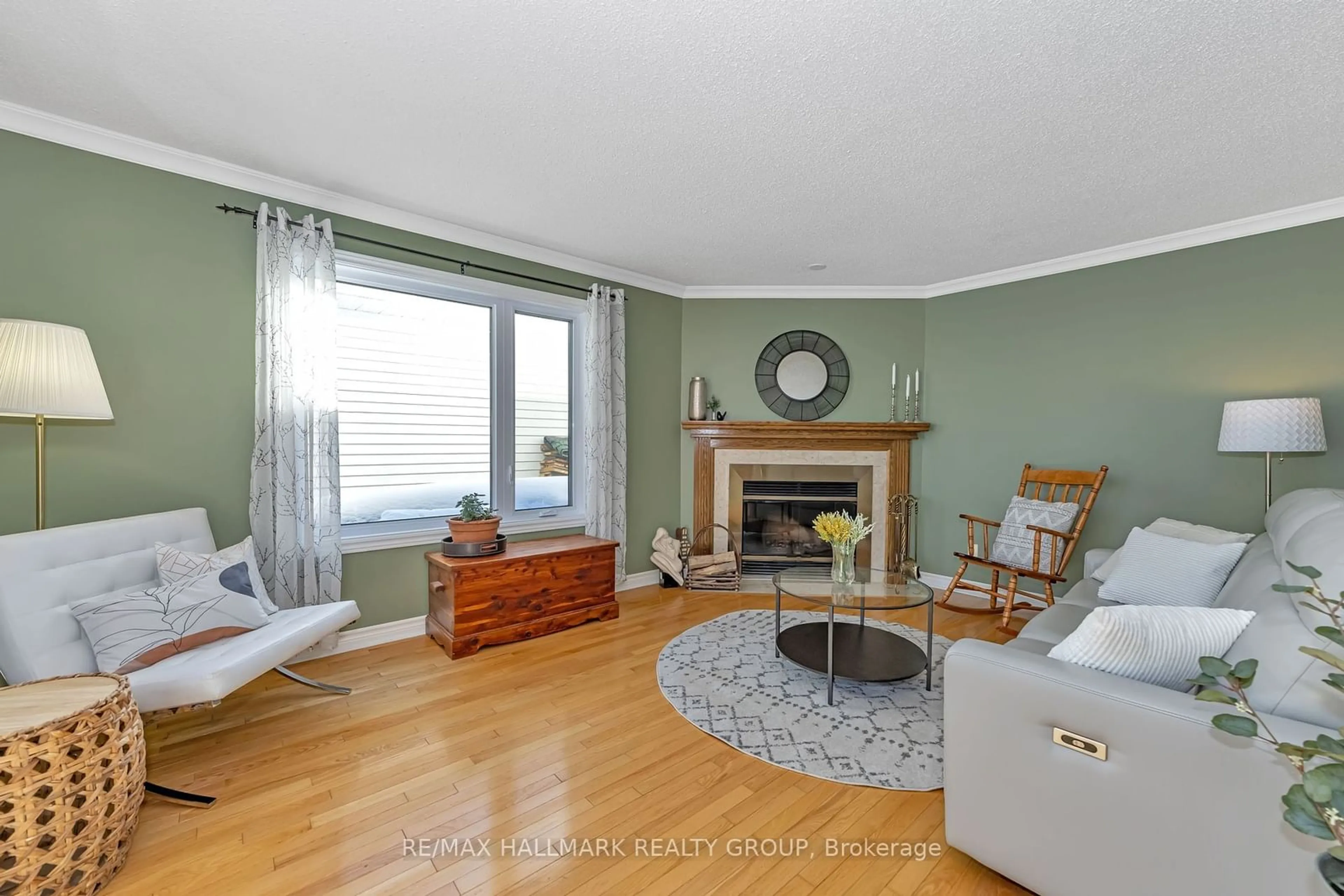 Living room with furniture, wood/laminate floor for 1367 CARAVEL Cres, Orleans - Cumberland and Area Ontario K1E 3X3