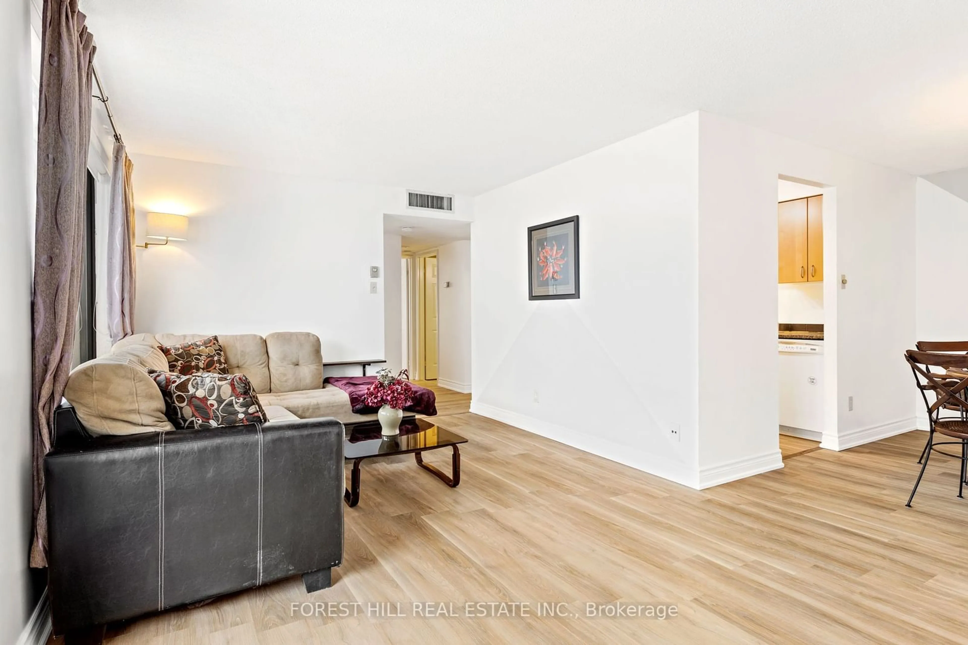 Living room with furniture, wood/laminate floor for 470 Laurier Ave #1703, Ottawa Centre Ontario K1R 7W9