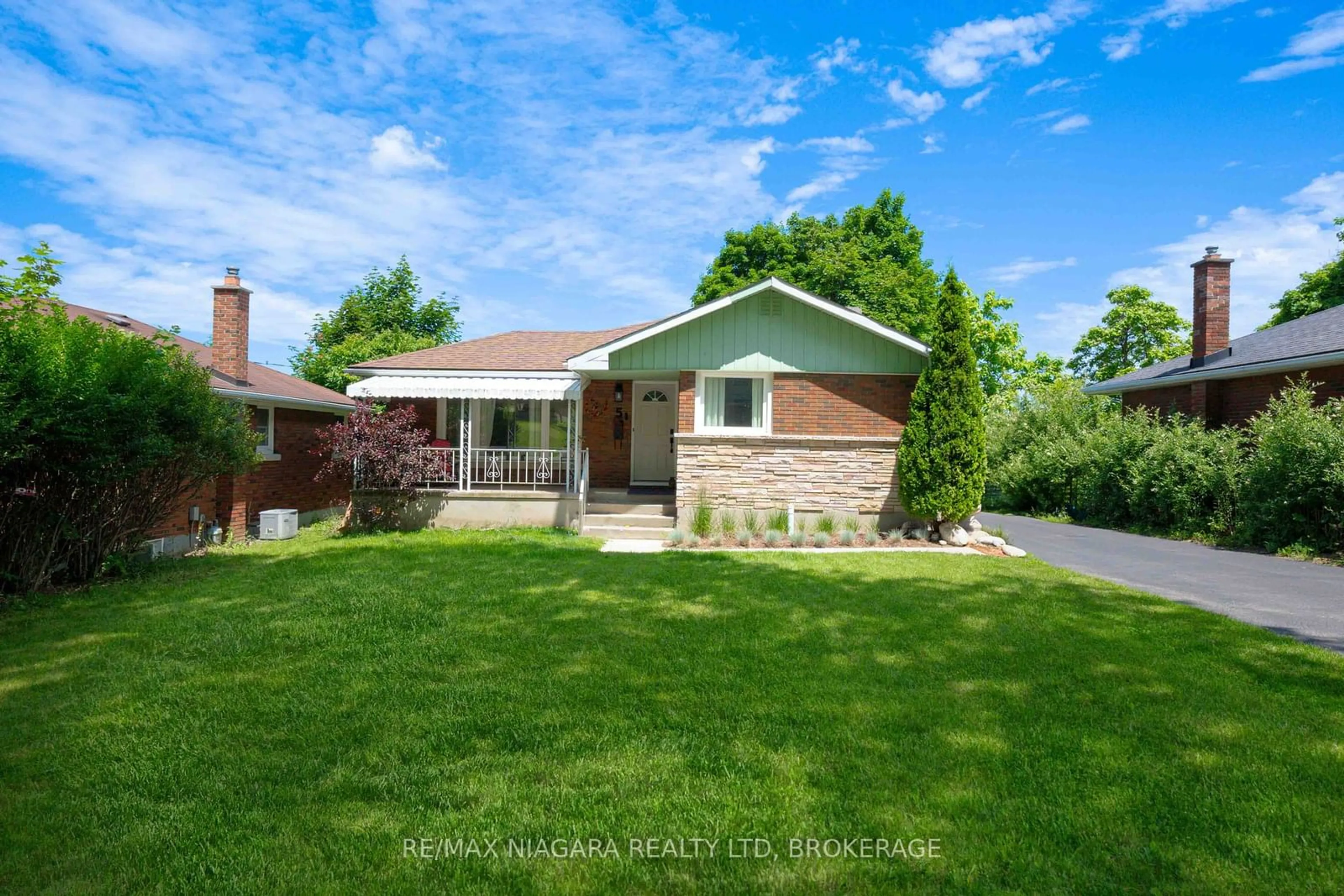 Home with brick exterior material, street for 5 ROCKDALE Ave, St. Catharines Ontario L2T 1V3