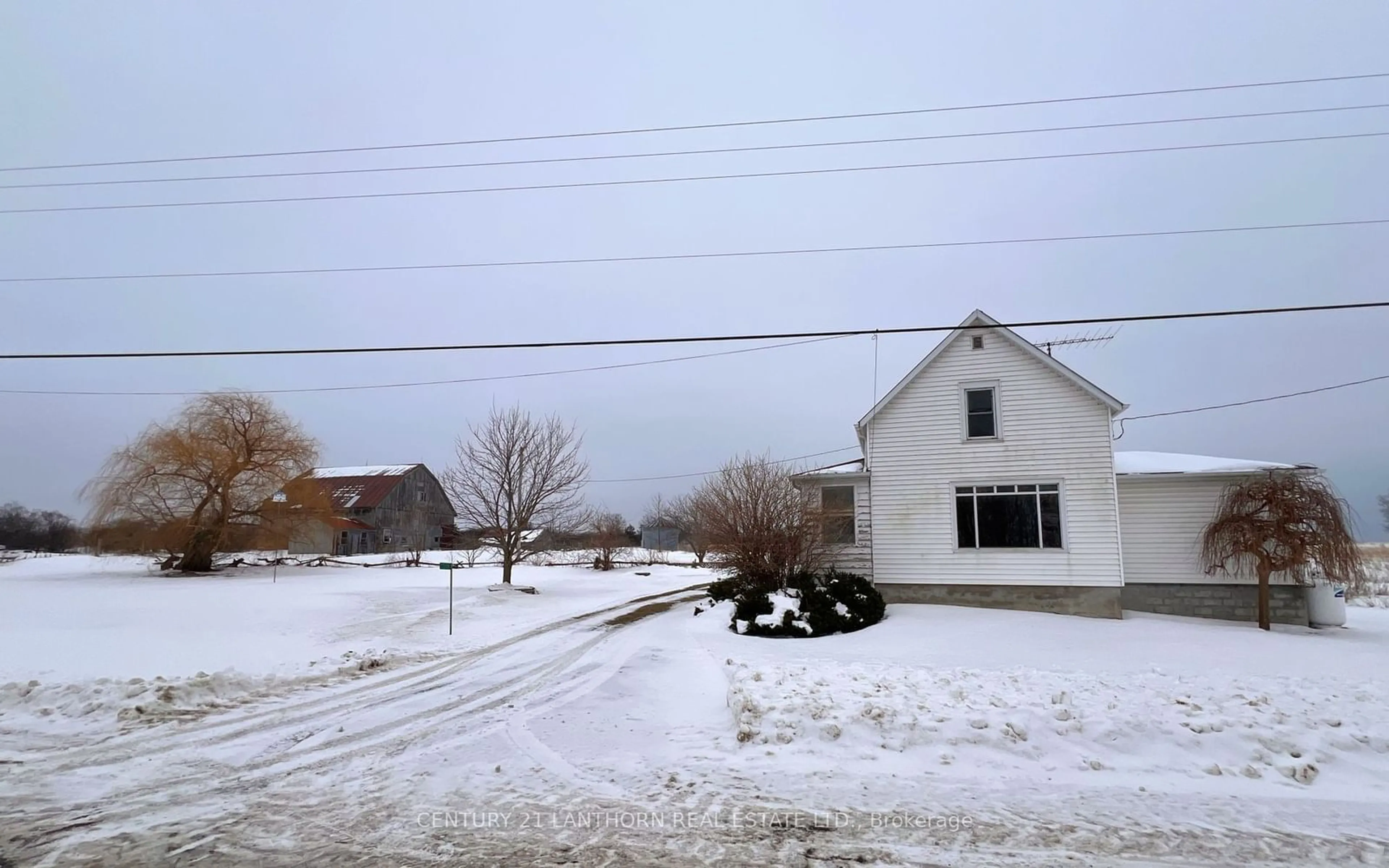 A pic from outside/outdoor area/front of a property/back of a property/a pic from drone, street for 1205 County Road 18 Rd, Prince Edward County Ontario K0K 1P0