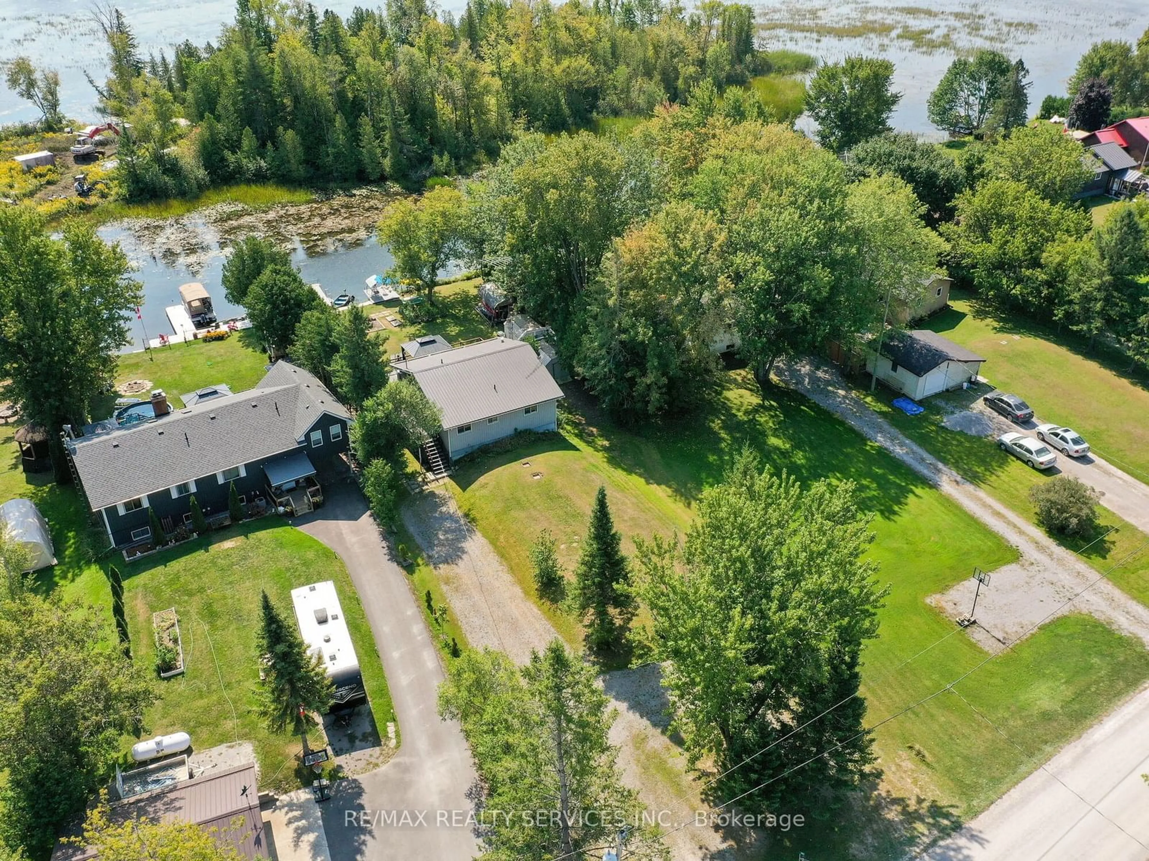 A pic from outside/outdoor area/front of a property/back of a property/a pic from drone, water/lake/river/ocean view for 183 Mcguire Beach Rd, Kawartha Lakes Ontario K0M 2B0