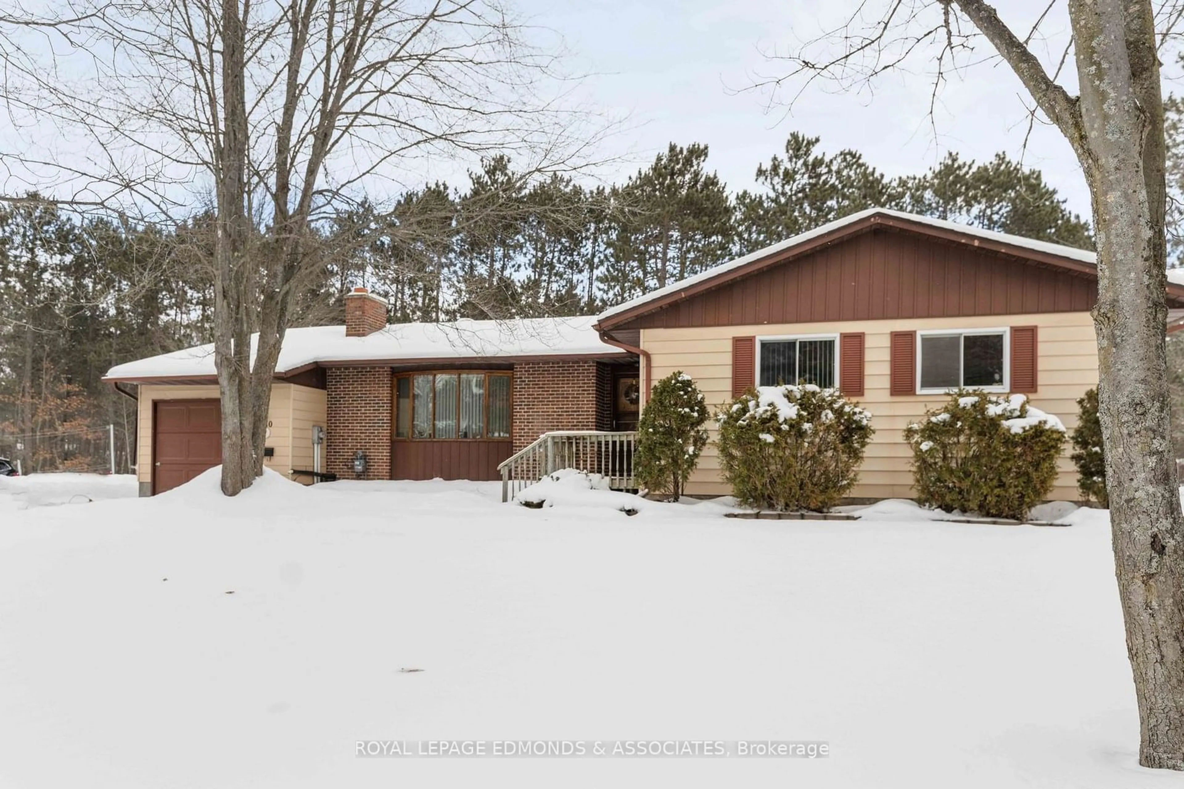Home with brick exterior material, street for 10 Mckay St, Petawawa Ontario K8H 3G8