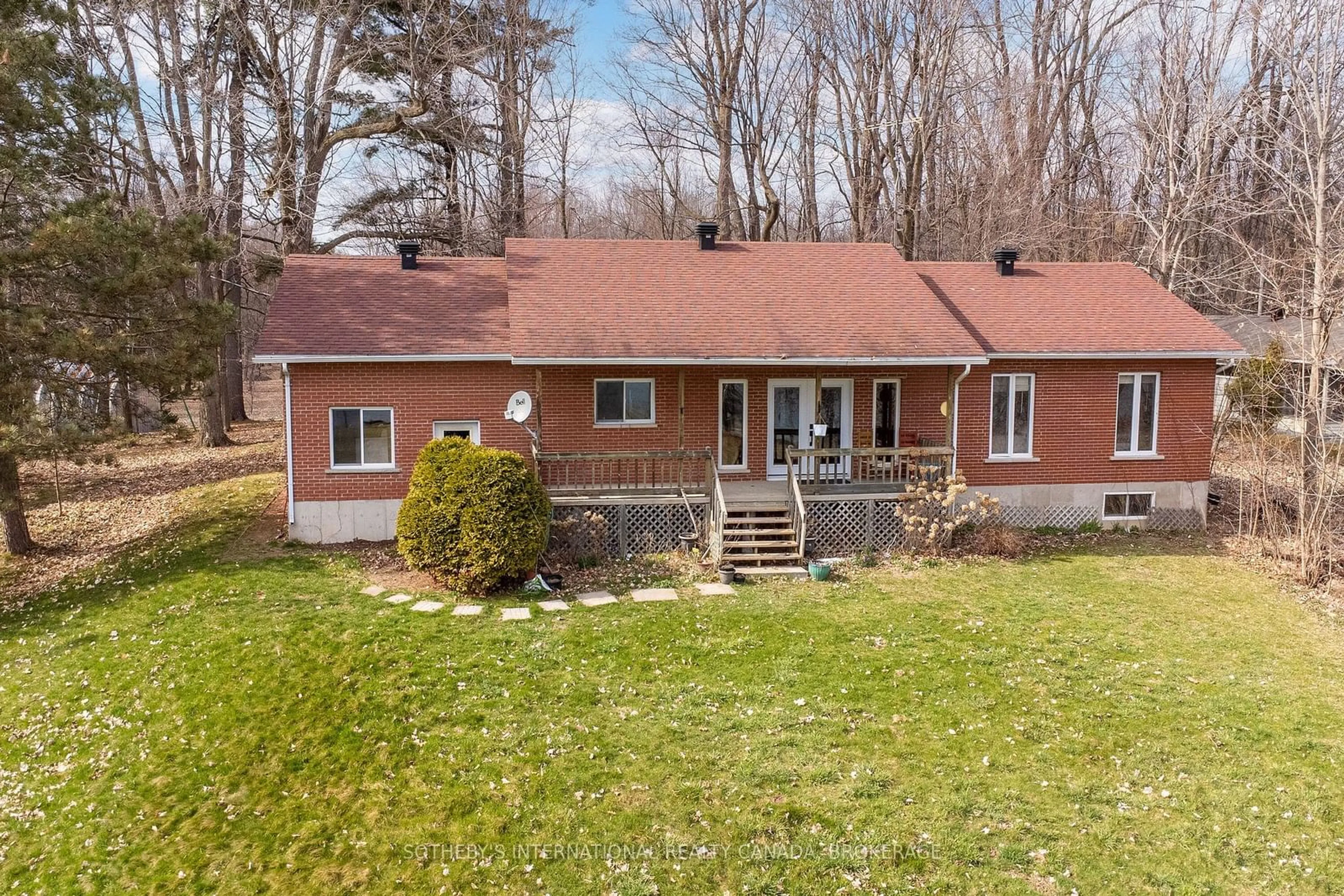 A pic from outside/outdoor area/front of a property/back of a property/a pic from drone, unknown for 20820 South Service Rd, South Glengarry Ontario K0C 1N0