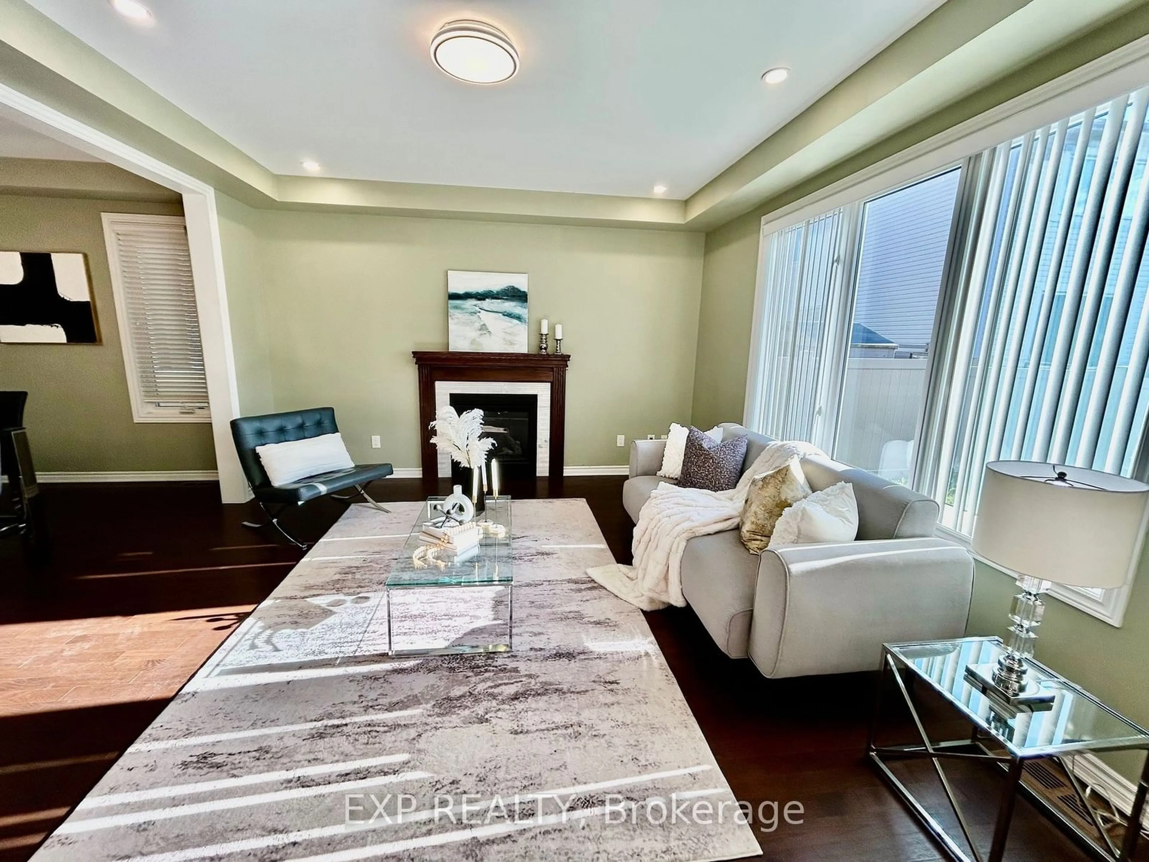 Living room with furniture, wood/laminate floor for 167 Santolina St, Stittsville - Munster - Richmond Ontario K2S 0W9