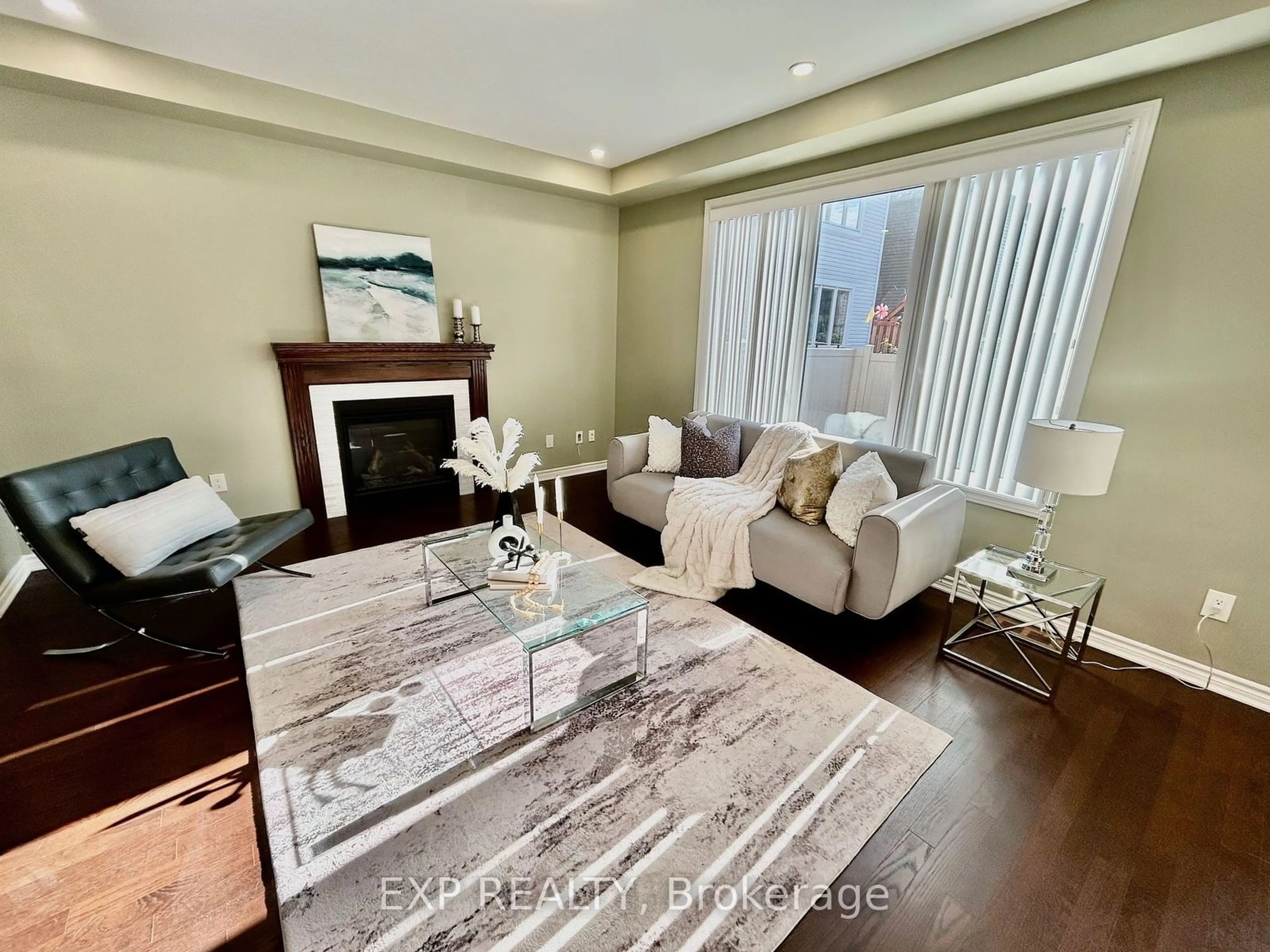 Living room with furniture, wood/laminate floor for 167 Santolina St, Stittsville - Munster - Richmond Ontario K2S 0W9