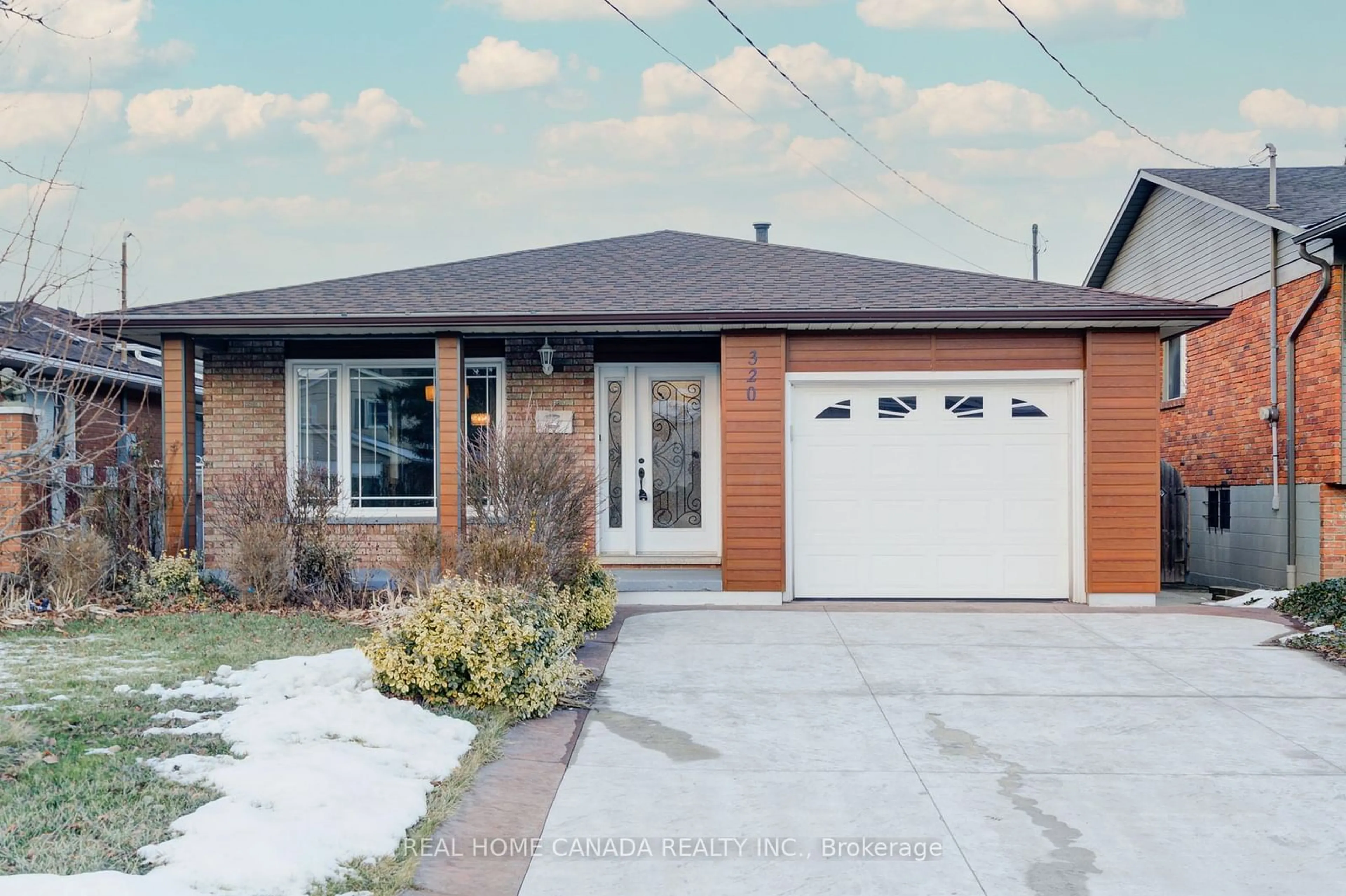 Home with brick exterior material, street for 320 Highridge Ave, Hamilton Ontario L8E 3W4