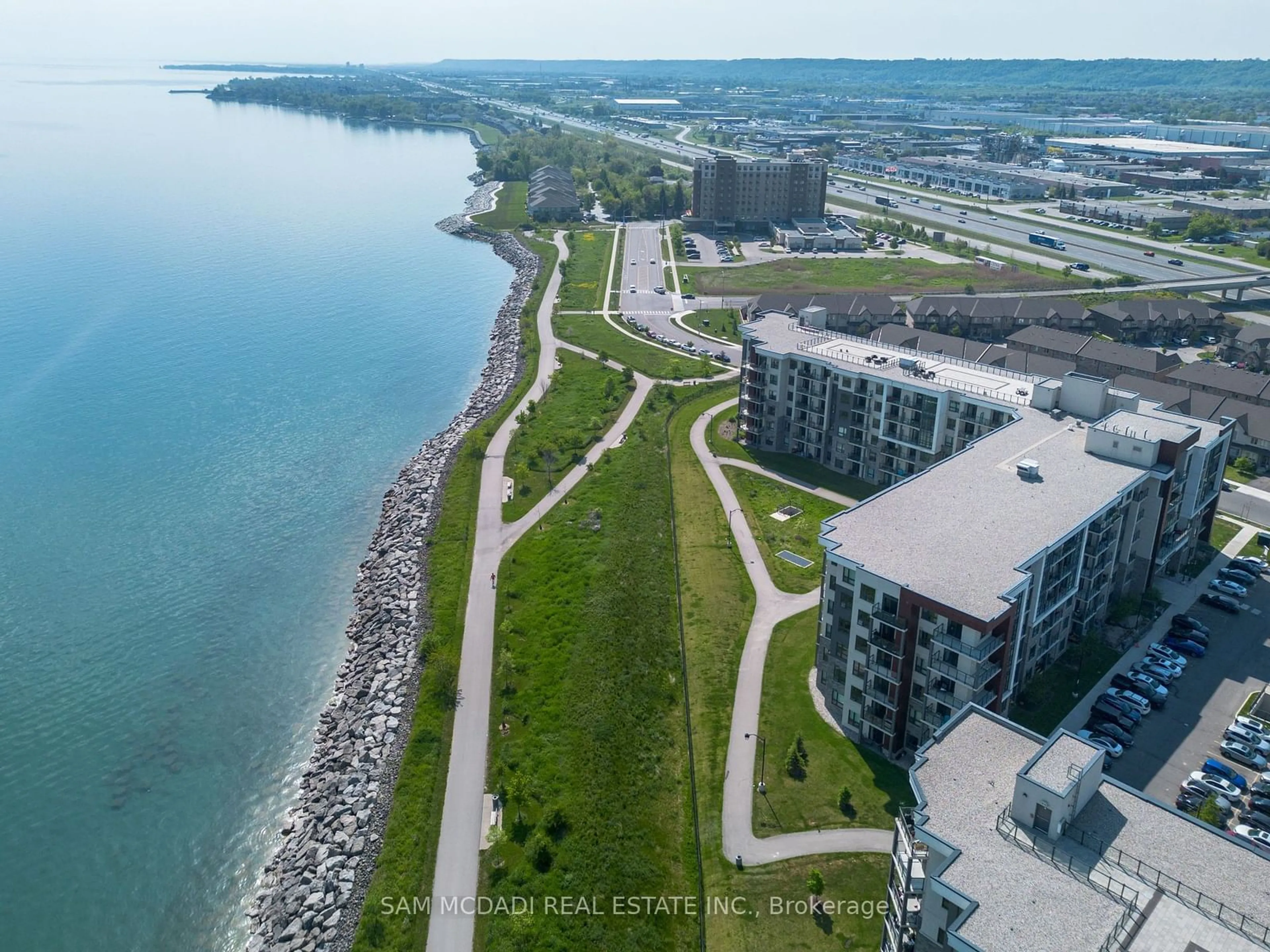 A pic from outside/outdoor area/front of a property/back of a property/a pic from drone, water/lake/river/ocean view for 101 Shoreview Pl #207, Hamilton Ontario L8E 0K2