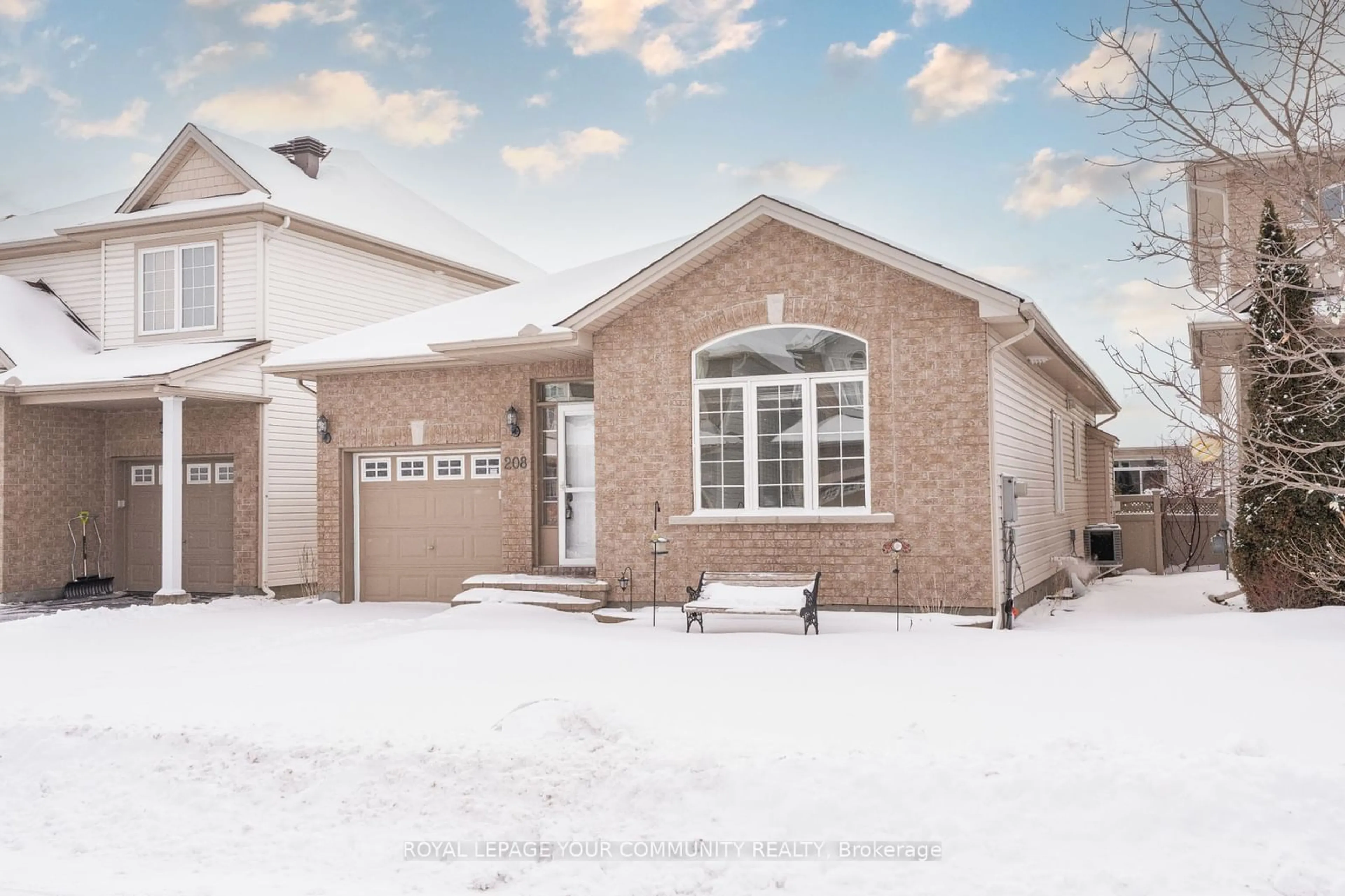 Home with brick exterior material, street for 208 Fountainhead Dr, Orleans - Convent Glen and Area Ontario K1W 0C2