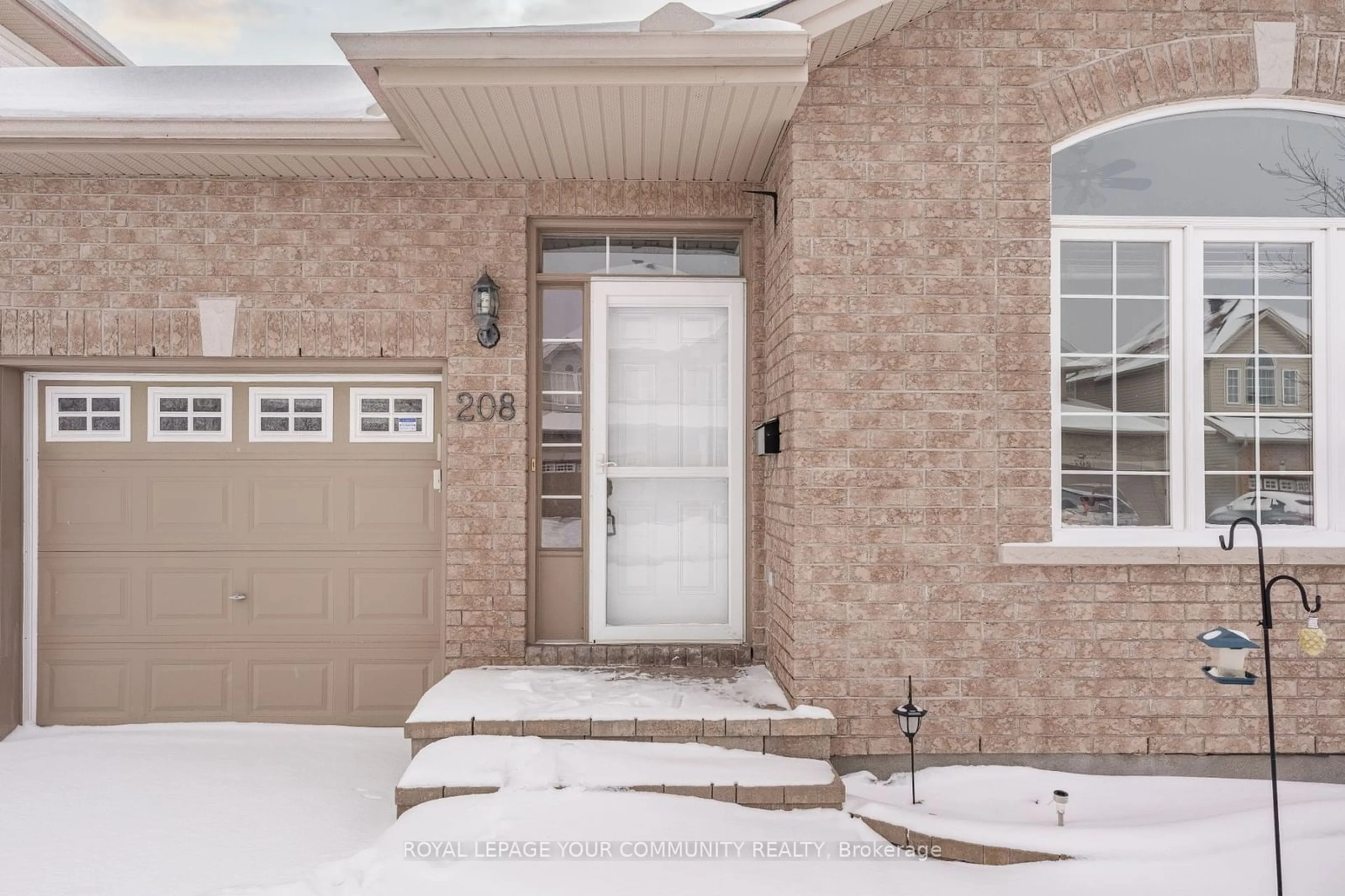 Home with brick exterior material, street for 208 Fountainhead Dr, Orleans - Convent Glen and Area Ontario K1W 0C2