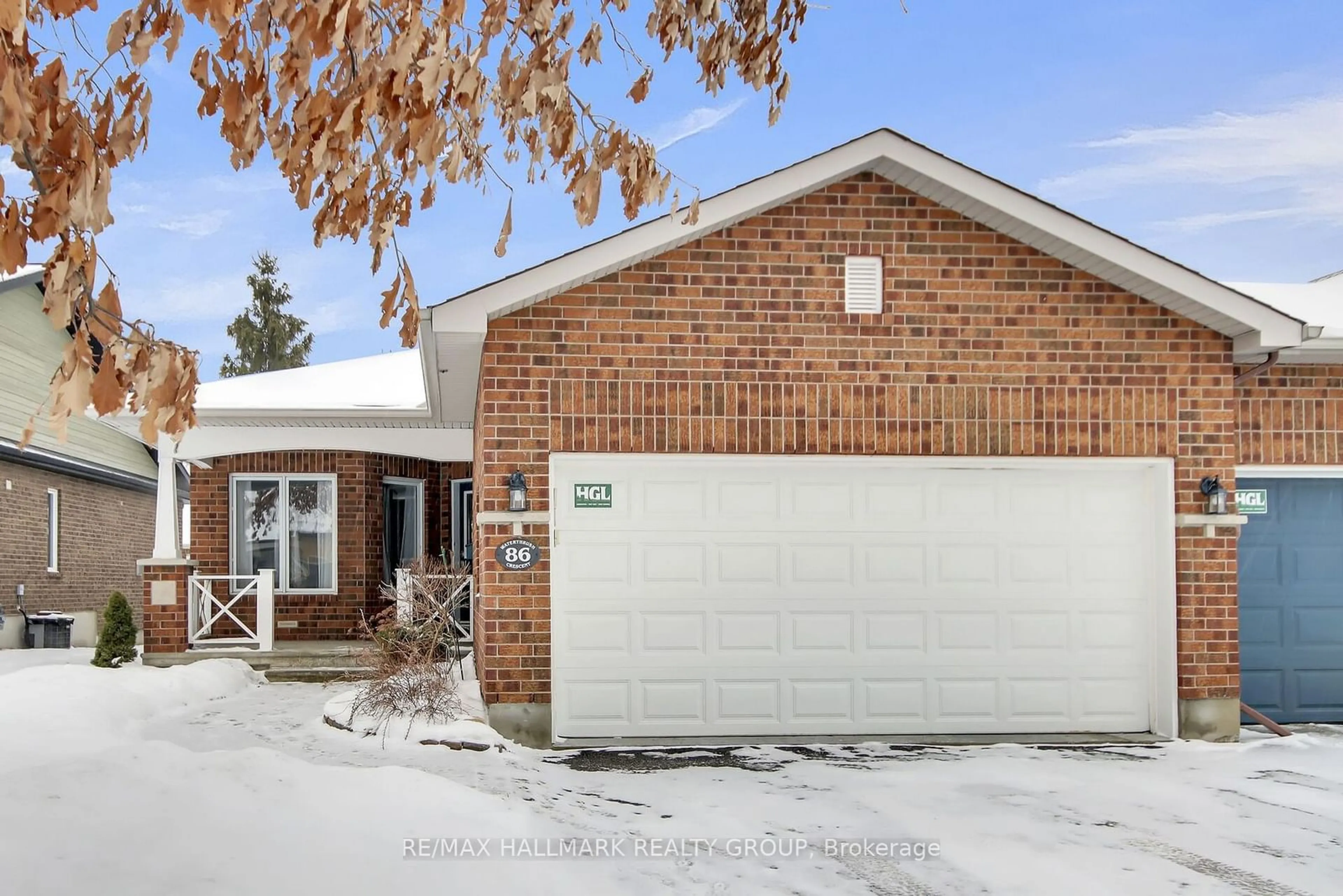Home with brick exterior material, street for 86 Waterthrush Cres, Ottawa Ontario K2M 2V1