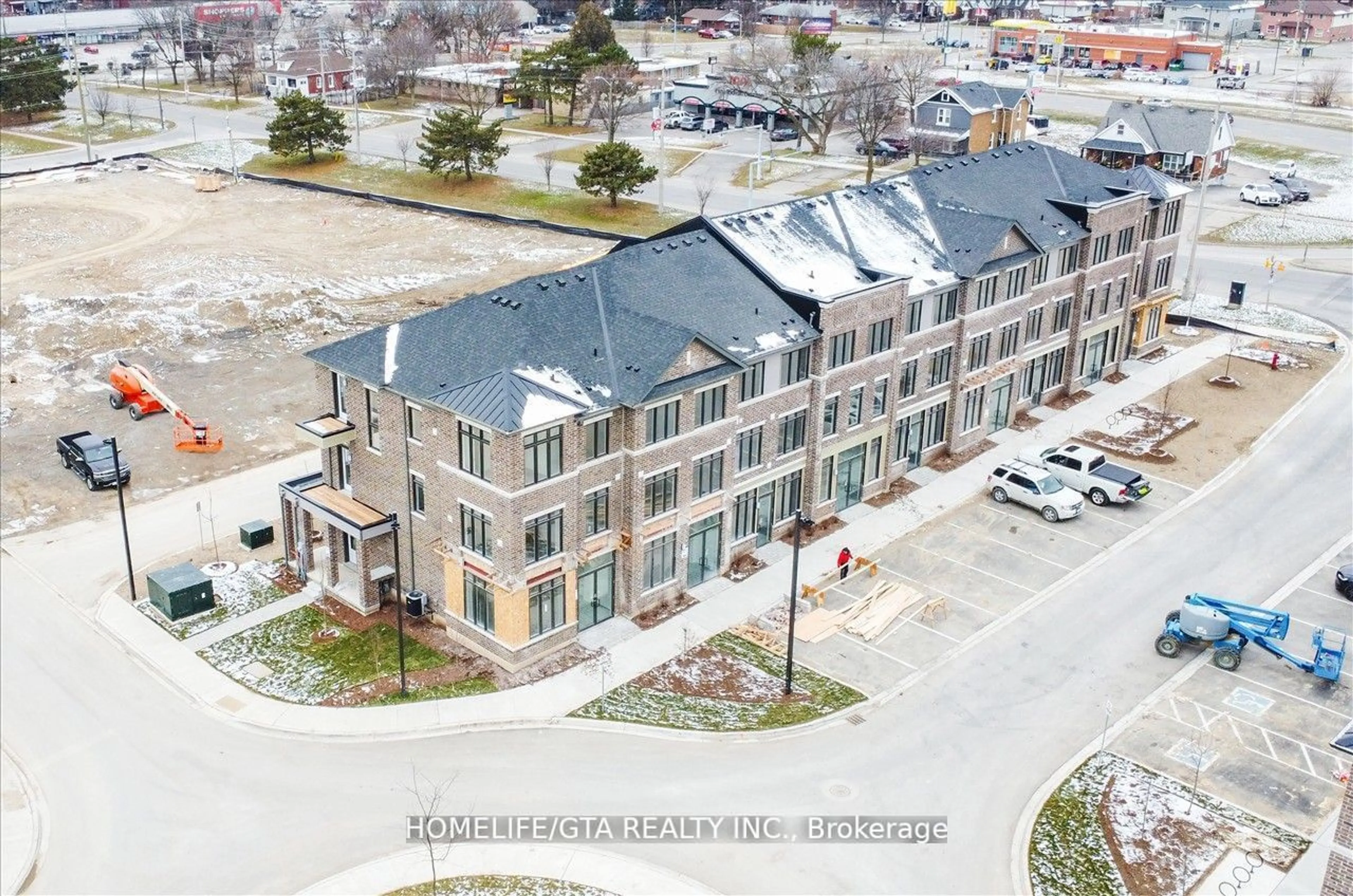 A pic from outside/outdoor area/front of a property/back of a property/a pic from drone, building for 585 Colborne St #202, Brantford Ontario N3S 3M7