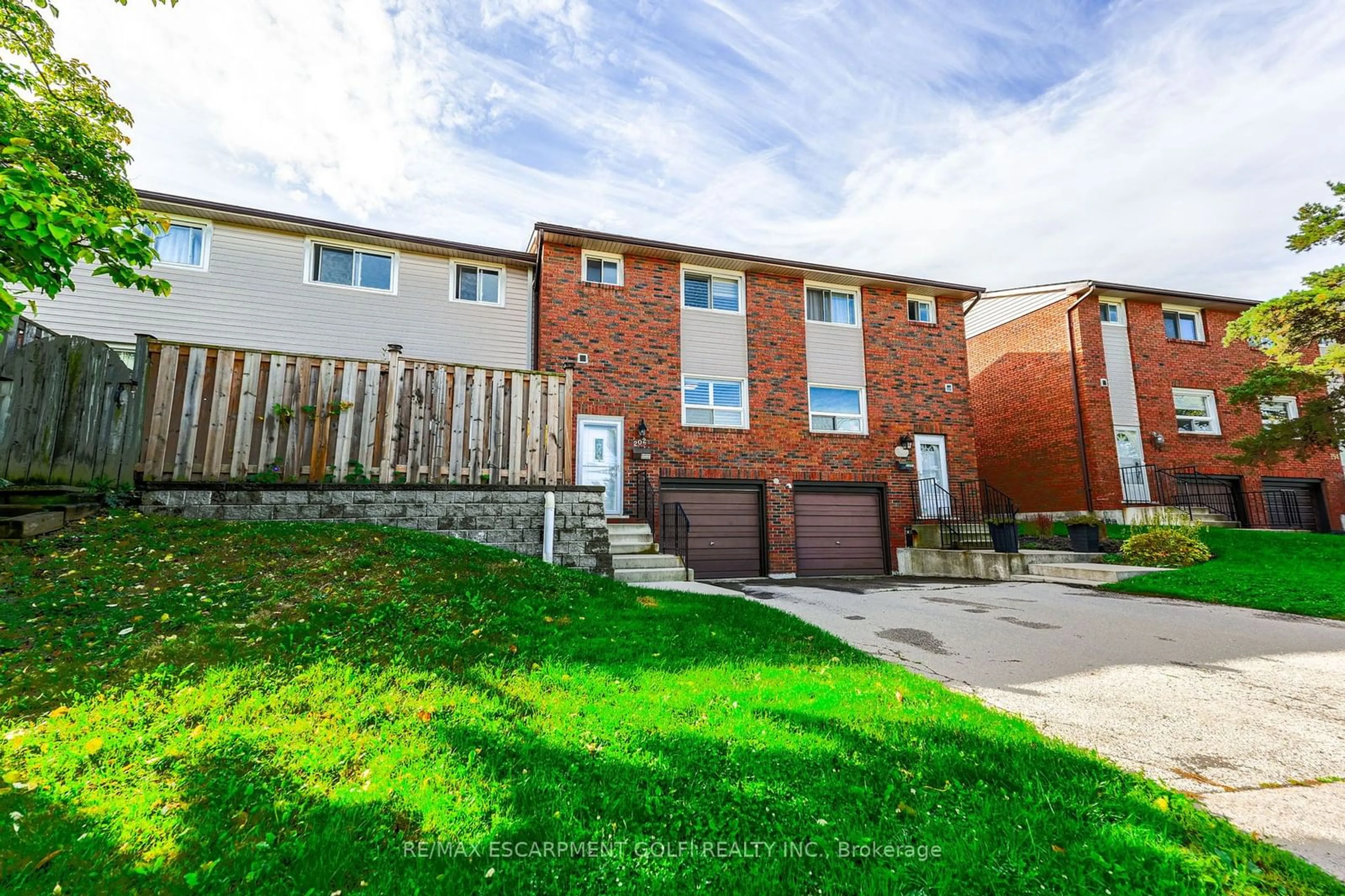 A pic from outside/outdoor area/front of a property/back of a property/a pic from drone, street for 202 Lavina Cres #10, Hamilton Ontario L9C 6R8