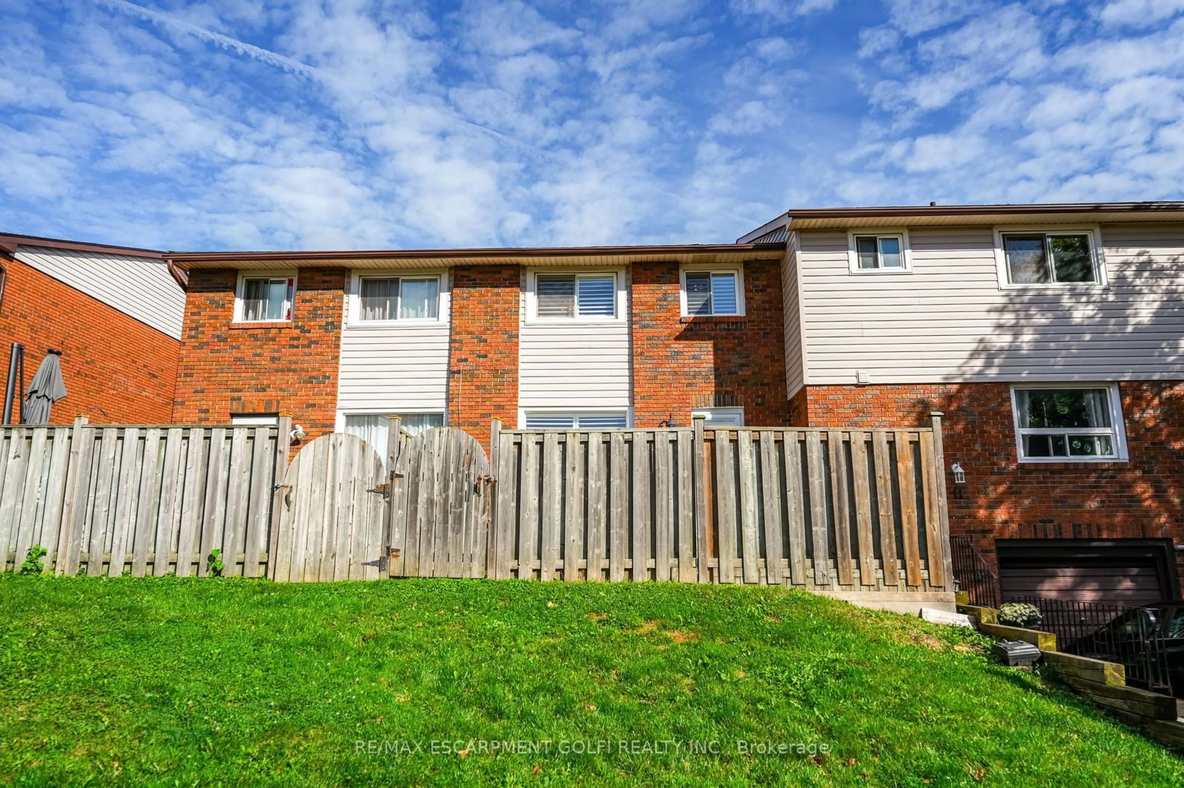 A pic from outside/outdoor area/front of a property/back of a property/a pic from drone, street for 202 Lavina Cres #10, Hamilton Ontario L9C 6R8