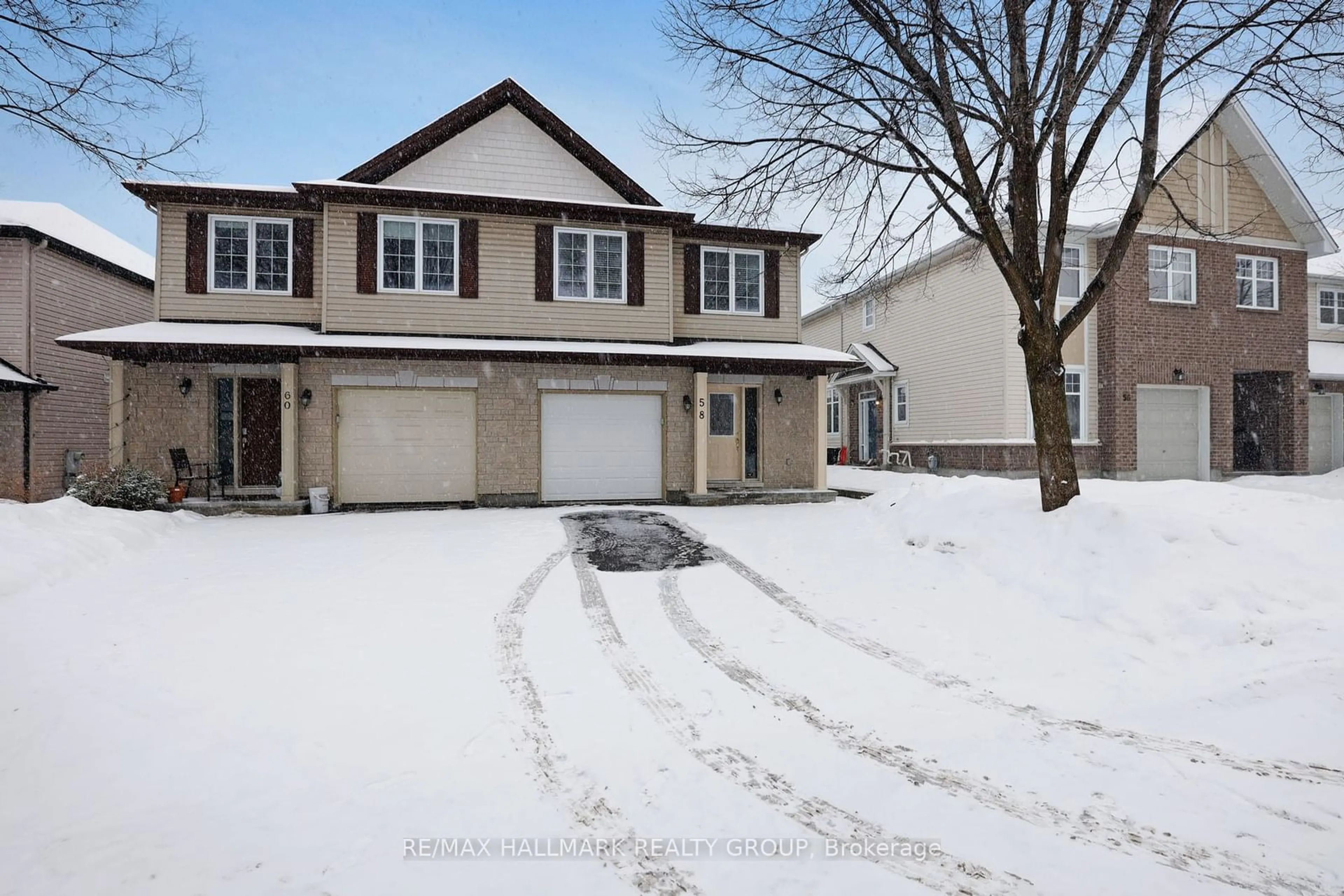 Home with vinyl exterior material, street for 58 Selhurst Ave, Ottawa Ontario K2G 7E5