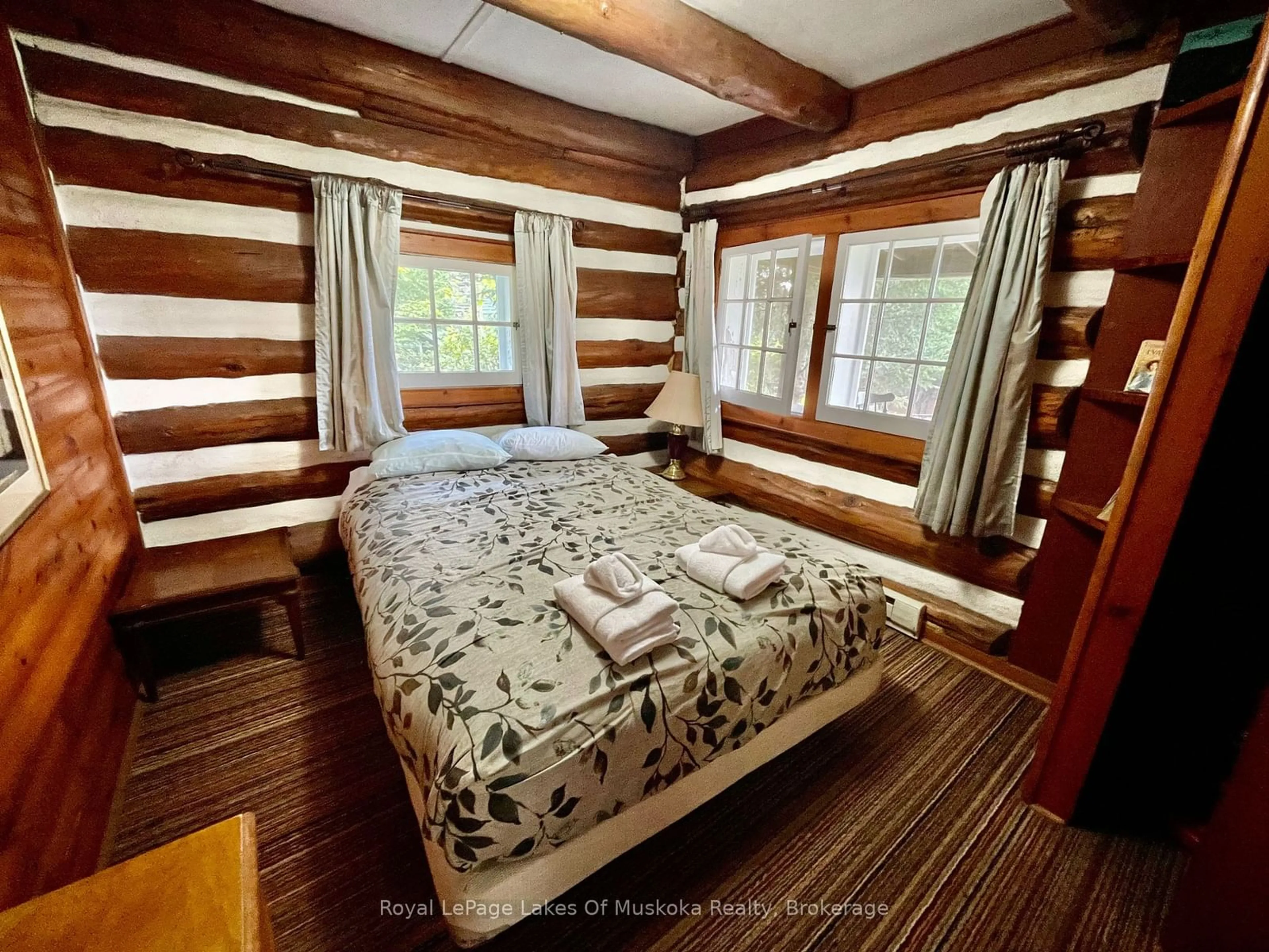 Bedroom with bed, wood/laminate floor for 1341 BILLIE BEAR Rd #5, Lake of Bays Ontario P1H 2J6