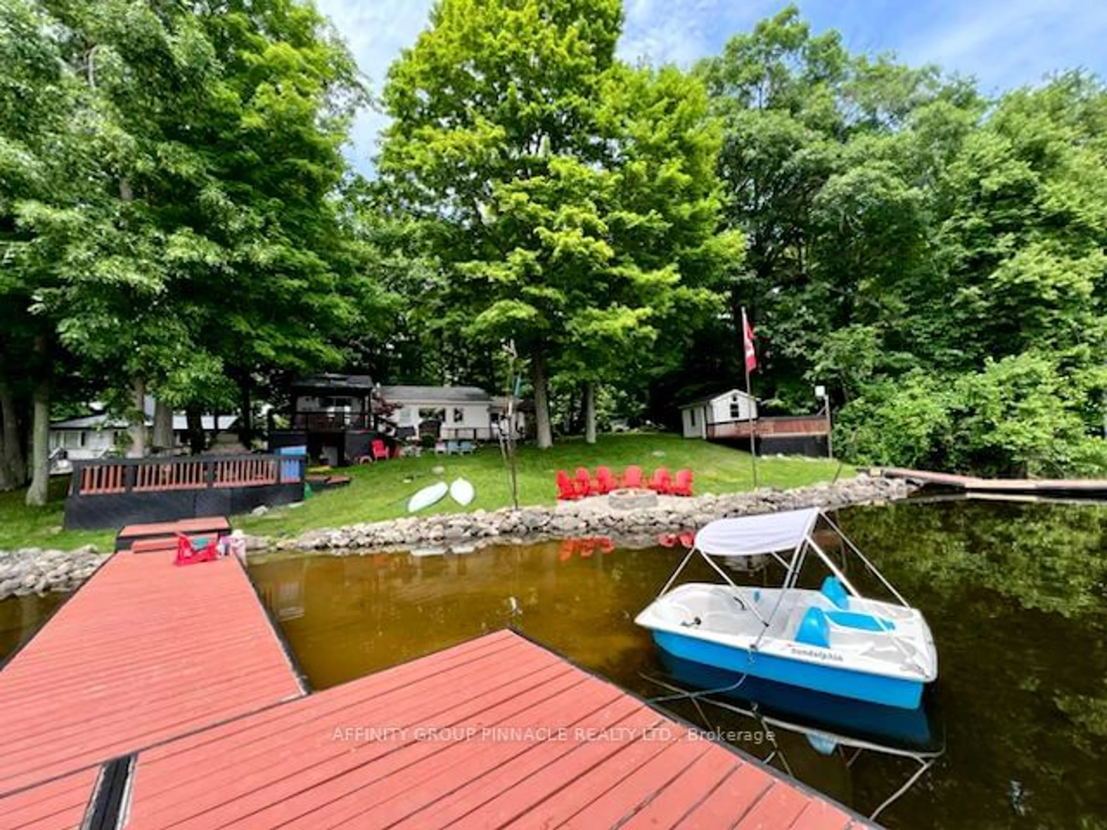 A pic from outside/outdoor area/front of a property/back of a property/a pic from drone, water/lake/river/ocean view for 1115 Cook Rd, Marmora and Lake Ontario K0K 2M0