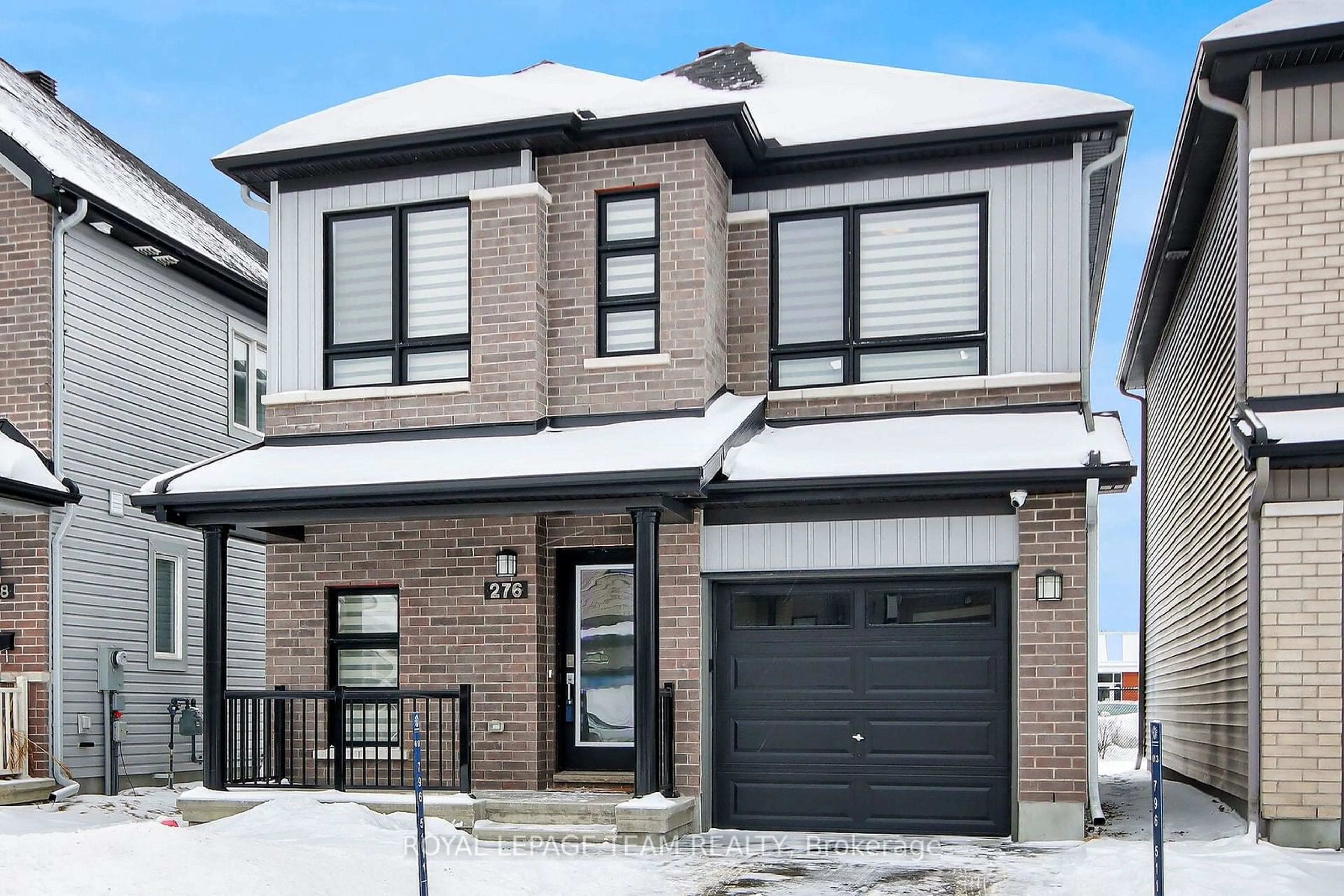 Home with brick exterior material, street for 276 Turnbuckle Cres, Barrhaven Ontario K2J 7B6