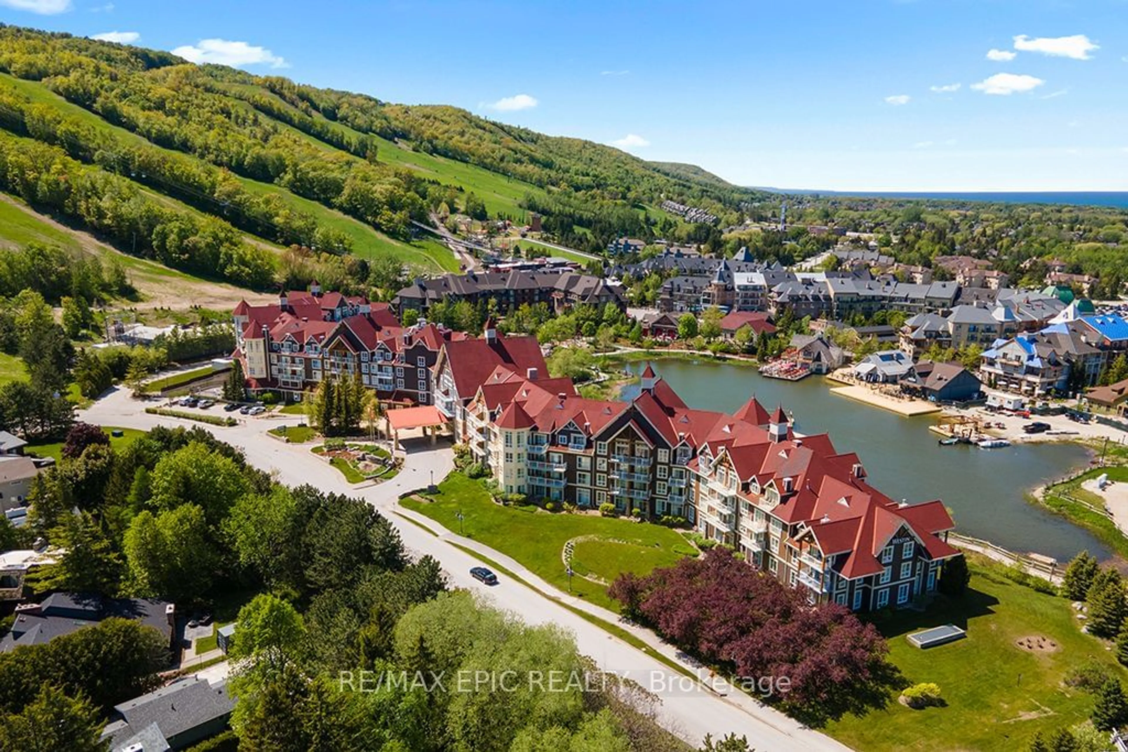 A pic from outside/outdoor area/front of a property/back of a property/a pic from drone, water/lake/river/ocean view for 220 Gord Canning Dr #272, Blue Mountains Ontario L9Y 3Z2