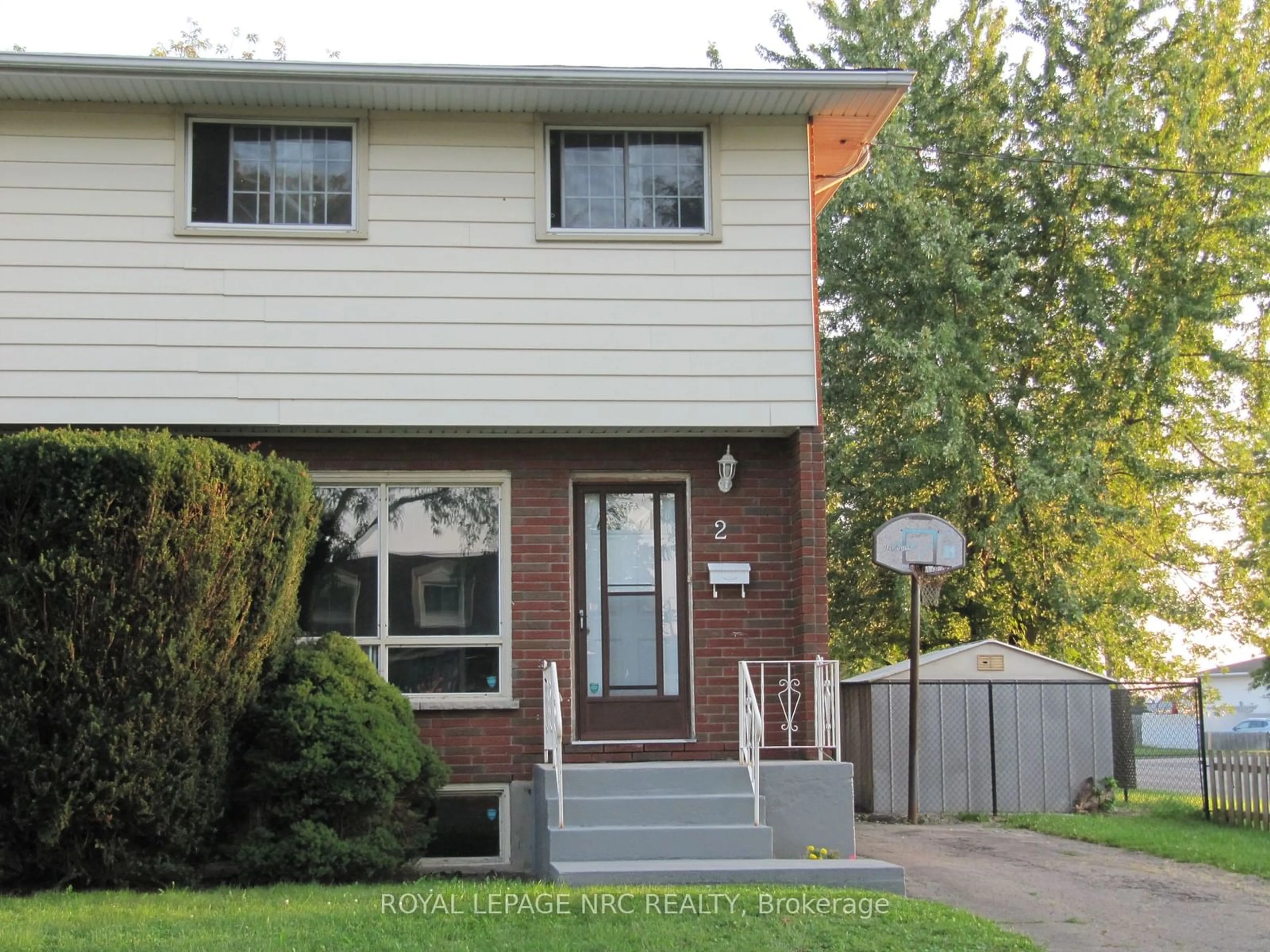 Home with brick exterior material, street for 2 Black Knight Rd, St. Catharines Ontario L2N 3C1