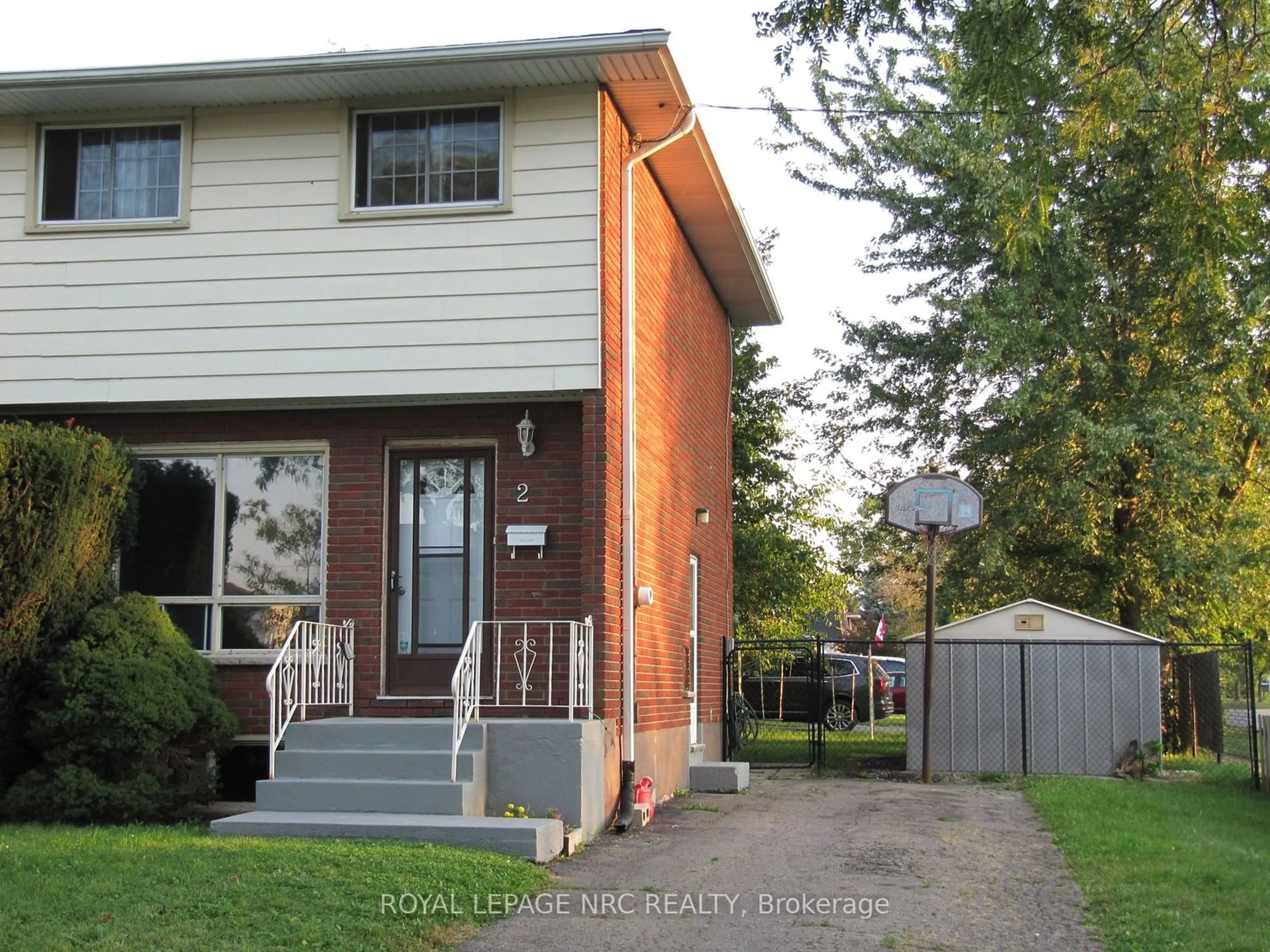 Home with brick exterior material, street for 2 Black Knight Rd, St. Catharines Ontario L2N 3C1