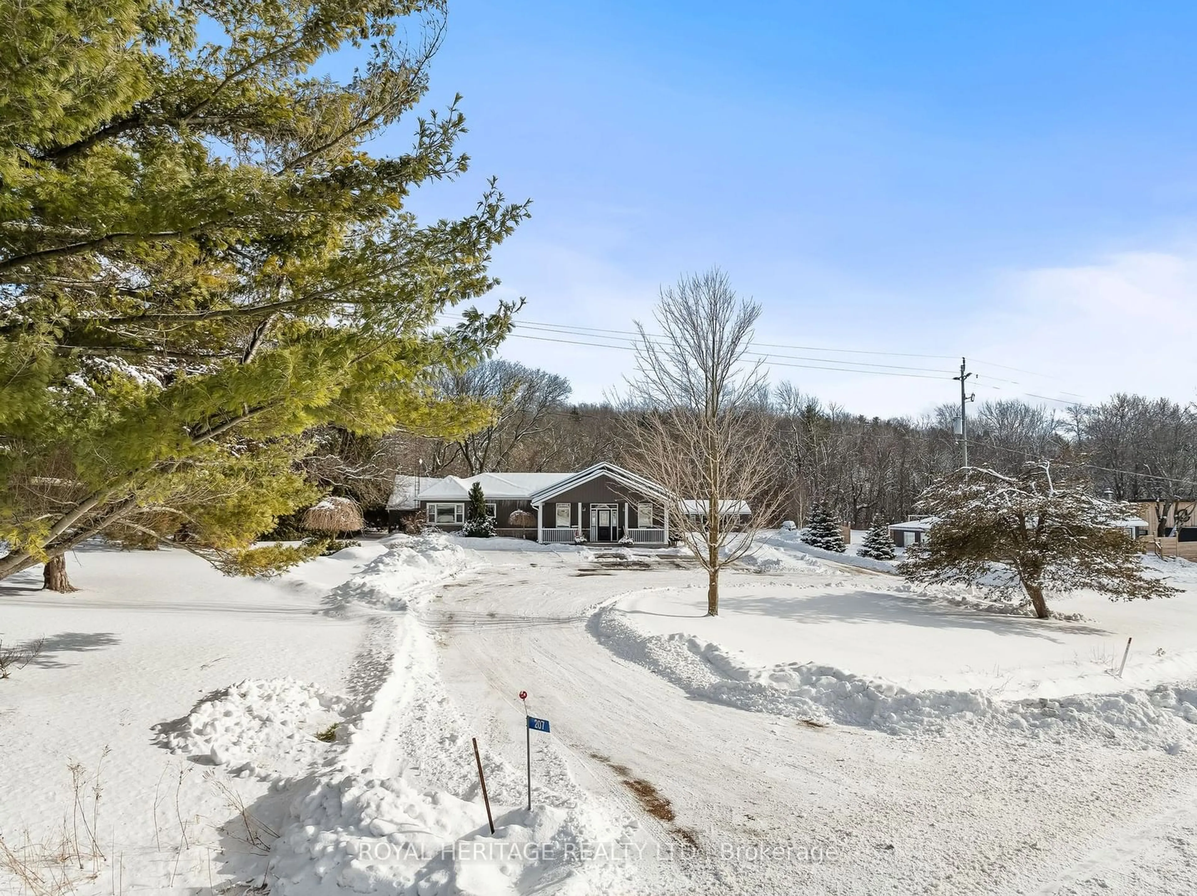 A pic from outside/outdoor area/front of a property/back of a property/a pic from drone, mountain view for 207 County Rd 26 Rd, Brighton Ontario K0K 1H0