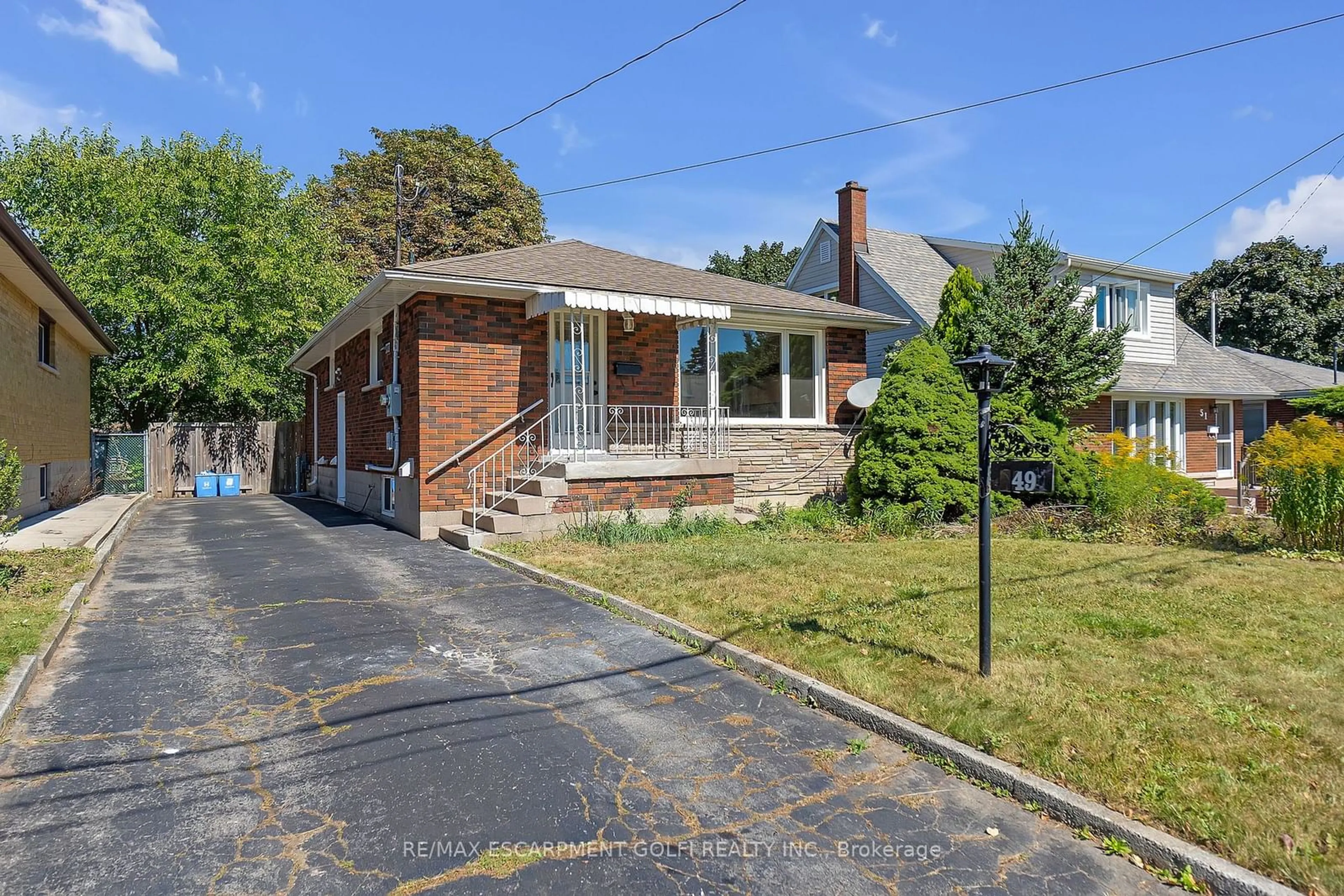 Home with brick exterior material, street for 49 Cheryl Ave, Hamilton Ontario L8V 1Y4