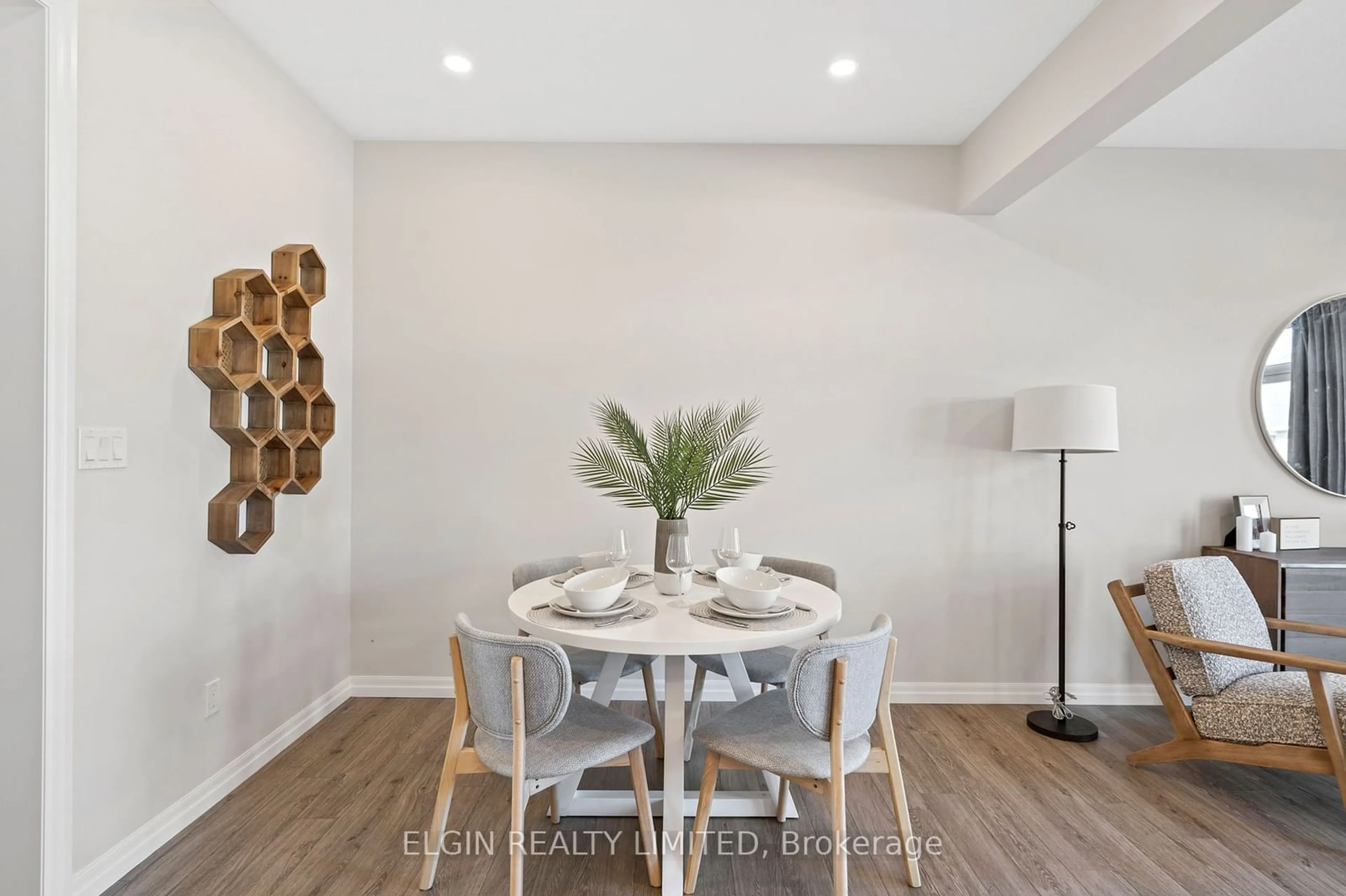 Dining room, wood/laminate floor for 238 Renaissance Dr, St. Thomas Ontario N5R 0P9