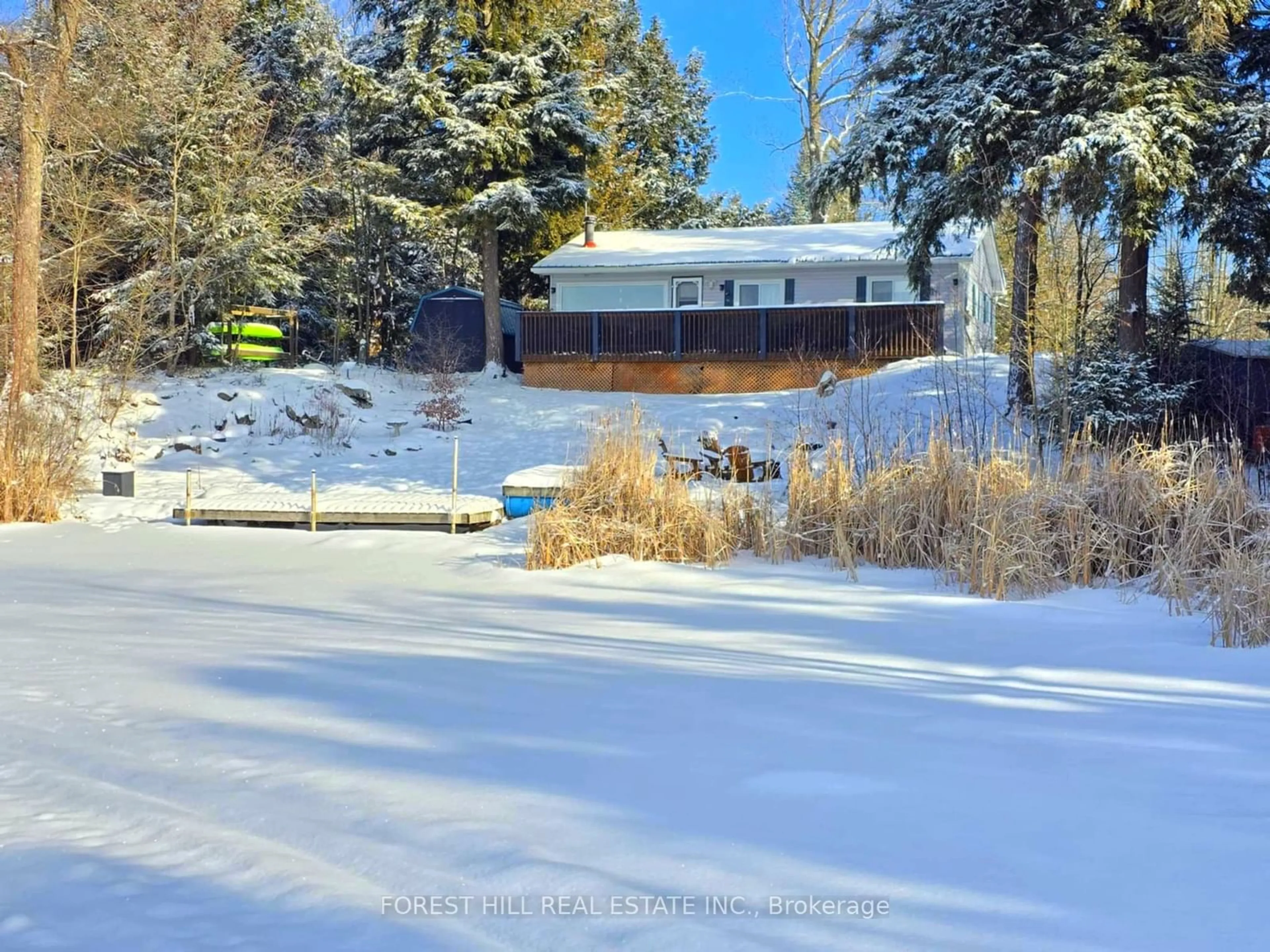 A pic from outside/outdoor area/front of a property/back of a property/a pic from drone, unknown for 36 Peninsula Dr, Galway-Cavendish and Harvey Ontario K0M 1A0